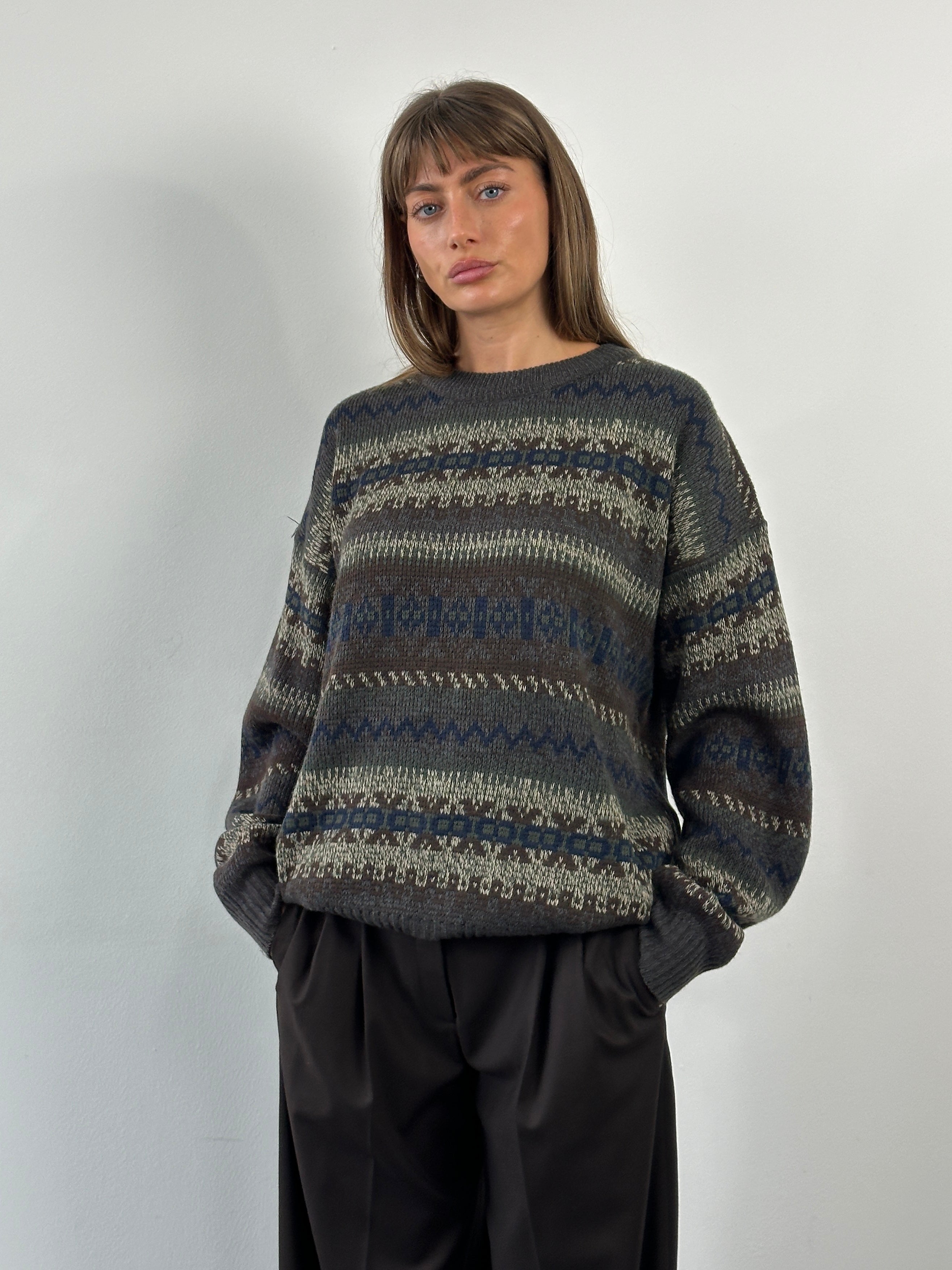 Vintage 1990s Fair Isle knitted jumper in XL, featuring colorful traditional patterns and cozy wool fabric.