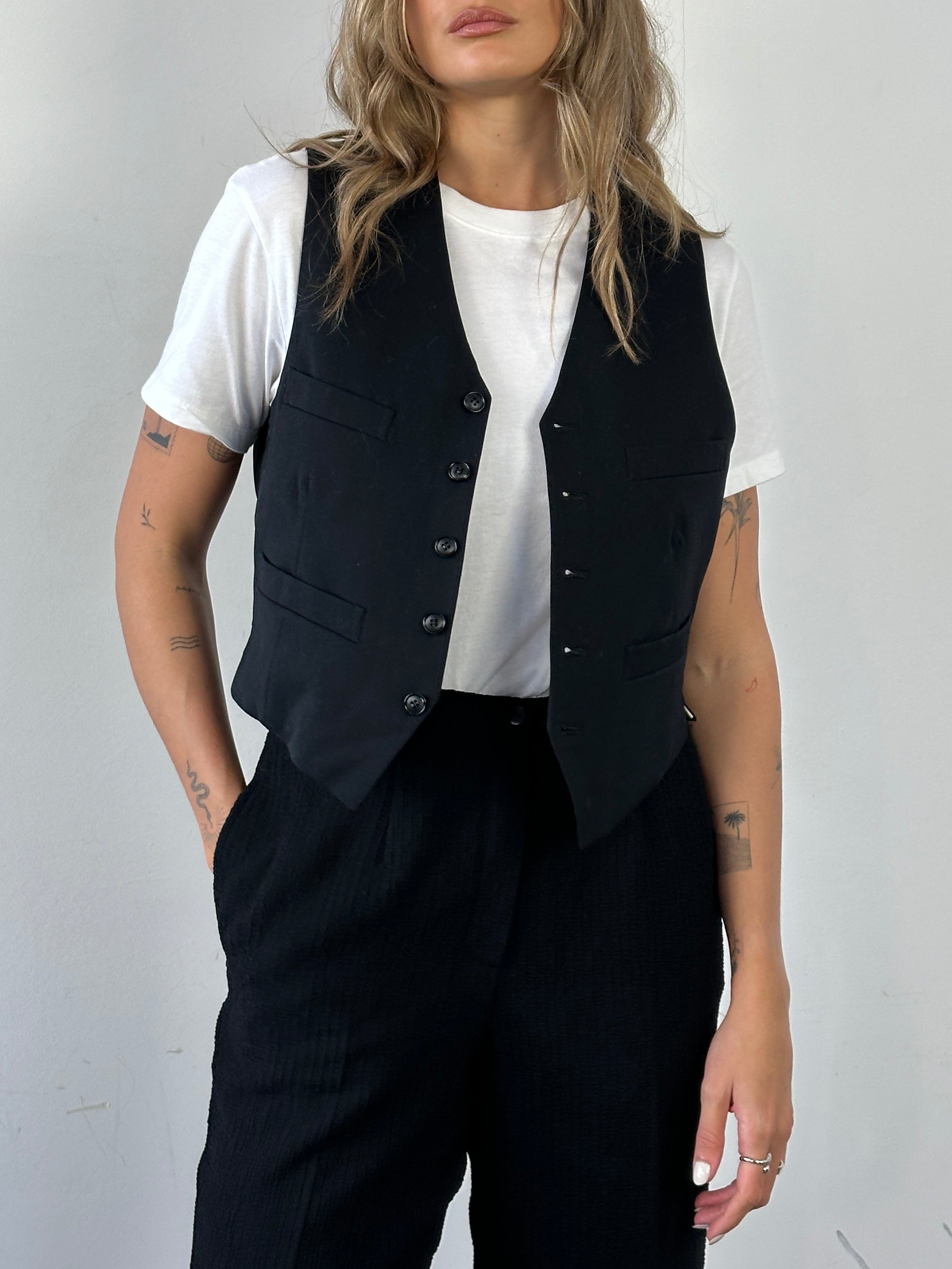 Vintage brand wool tuxedo waistcoat, size M, classic formal coat with tailored fit and vintage styling visible in the image.
