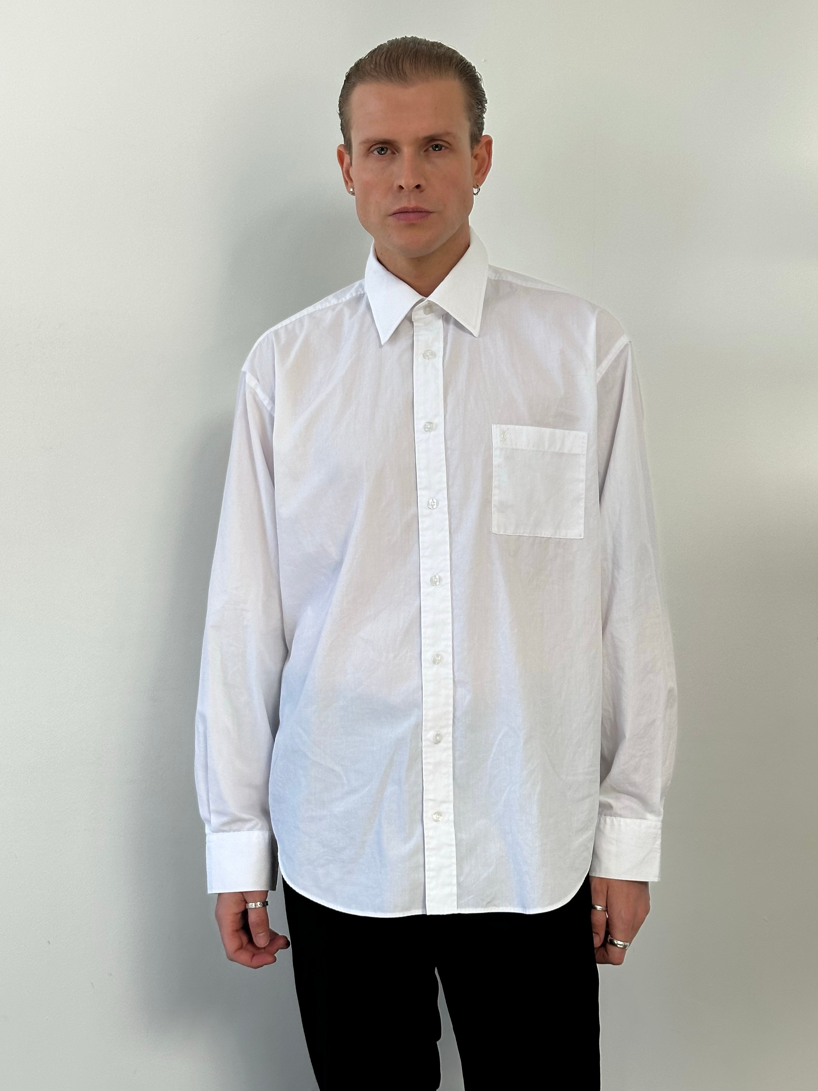 Yves Saint Laurent 1990s cotton logo shirt in XL, featuring classic branding and casual style, shown on a hanger.