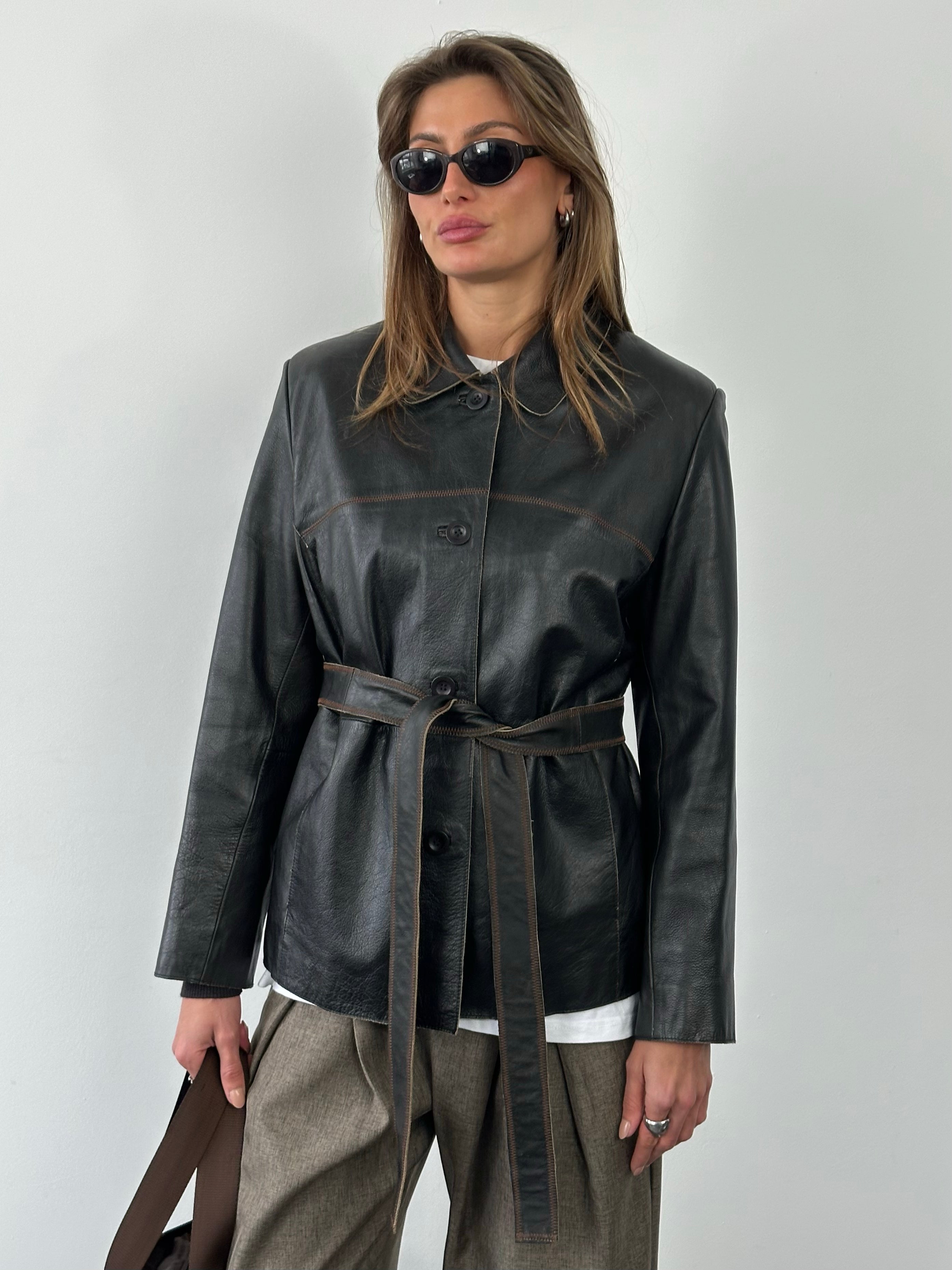 Vintage 1990s leather belted jacket, size small, featuring classic design, brown leather, and vintage style details.