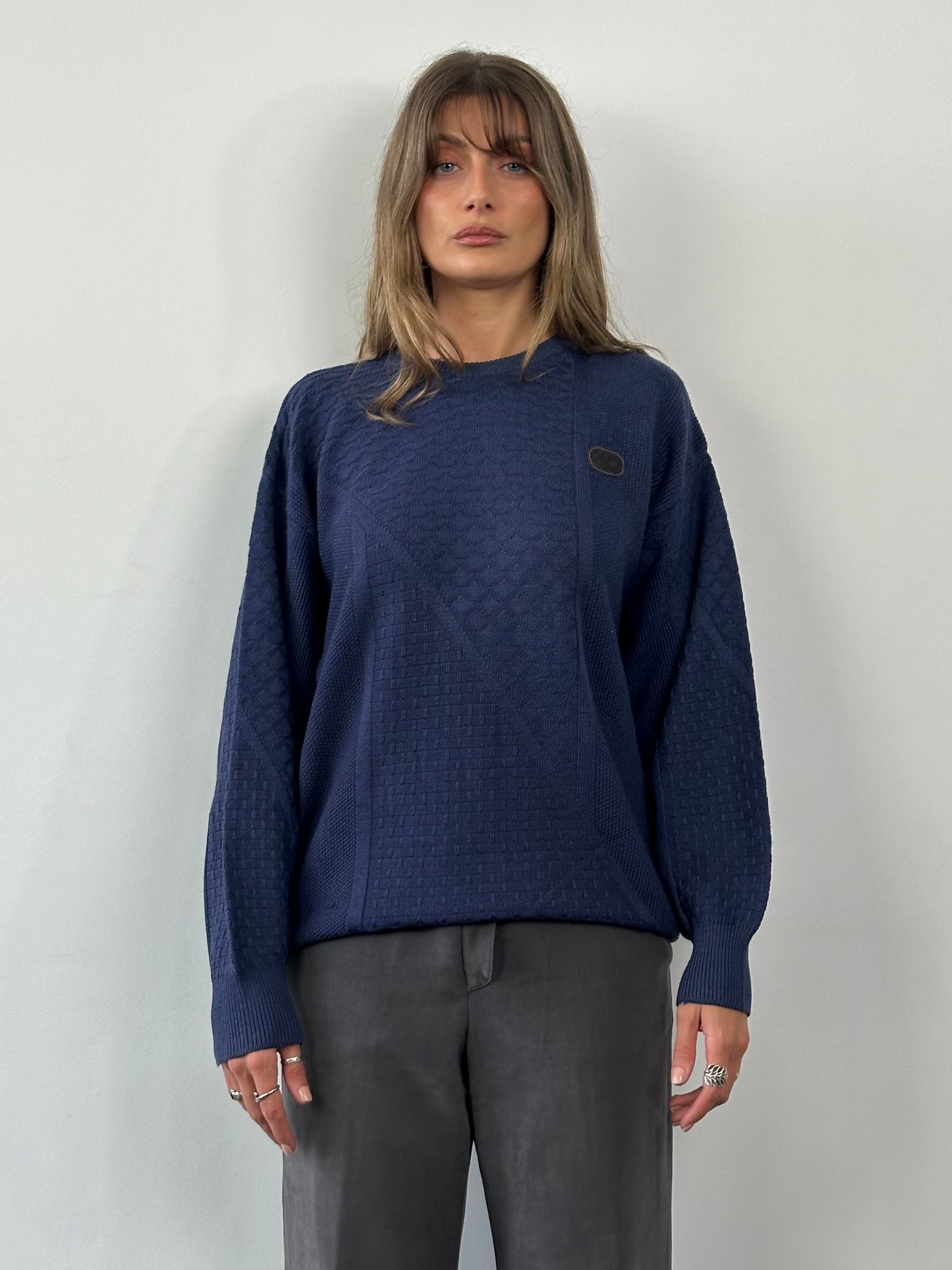 Valentino 1990s cotton cable knit logo jumper in size M/L, featuring classic knit pattern and brand logo detail.