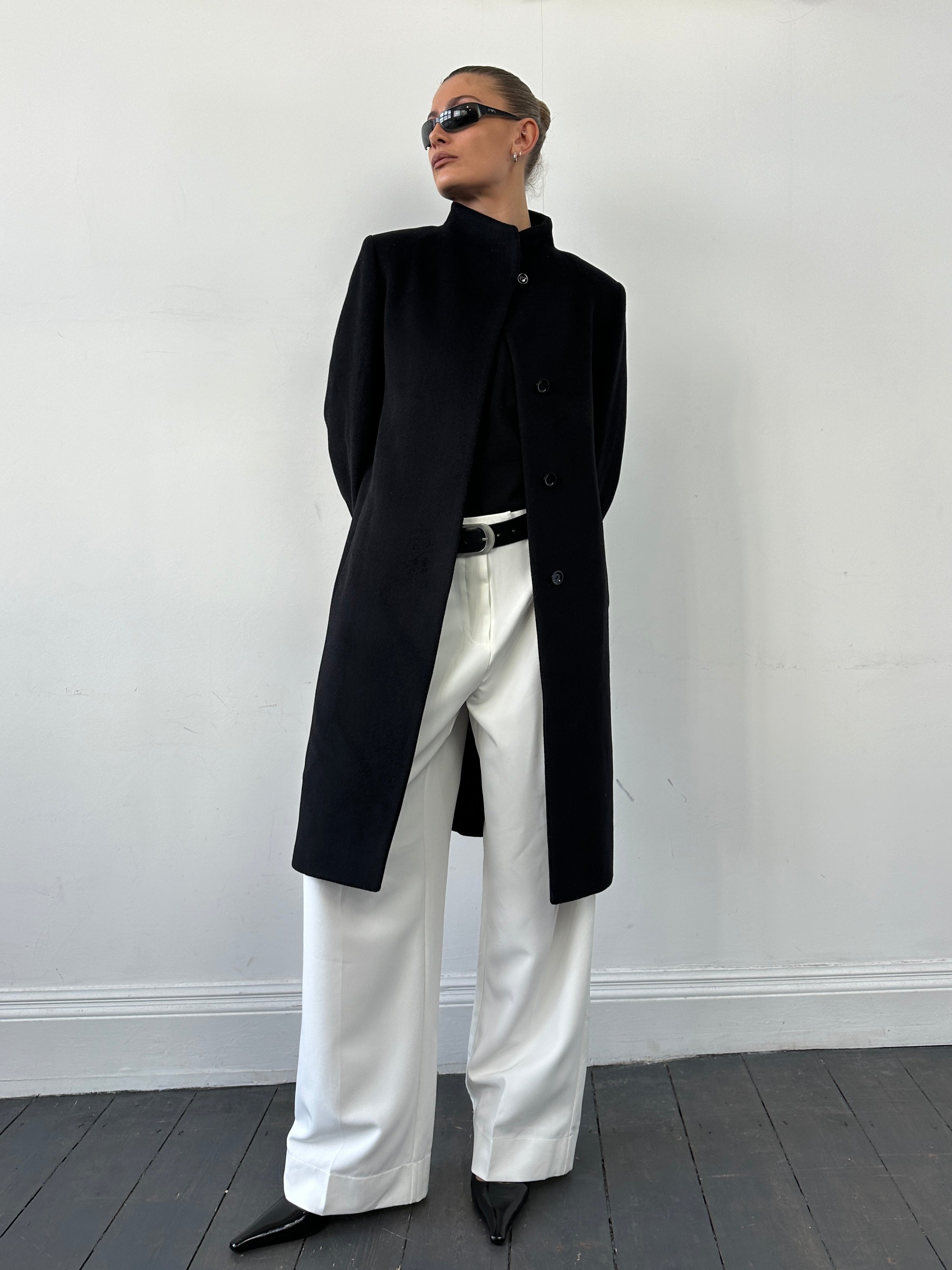 Cinzia Rocca minimal high-neck pure wool coat in beige, front view showing tailored design and classic collar.