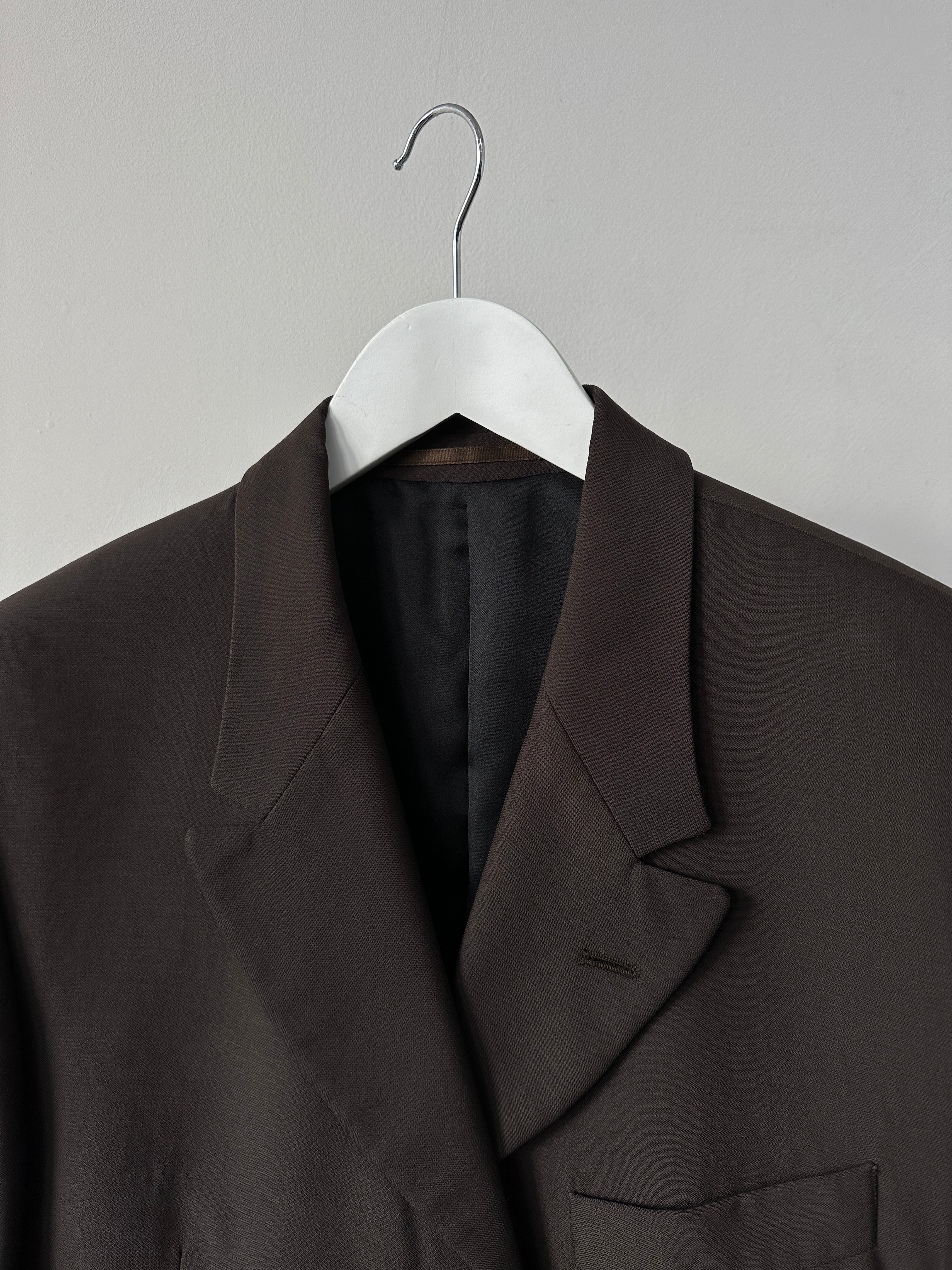 Vintage wool single-breasted longline blazer coat in size 42S/XL, featuring classic tailored design and vintage style.