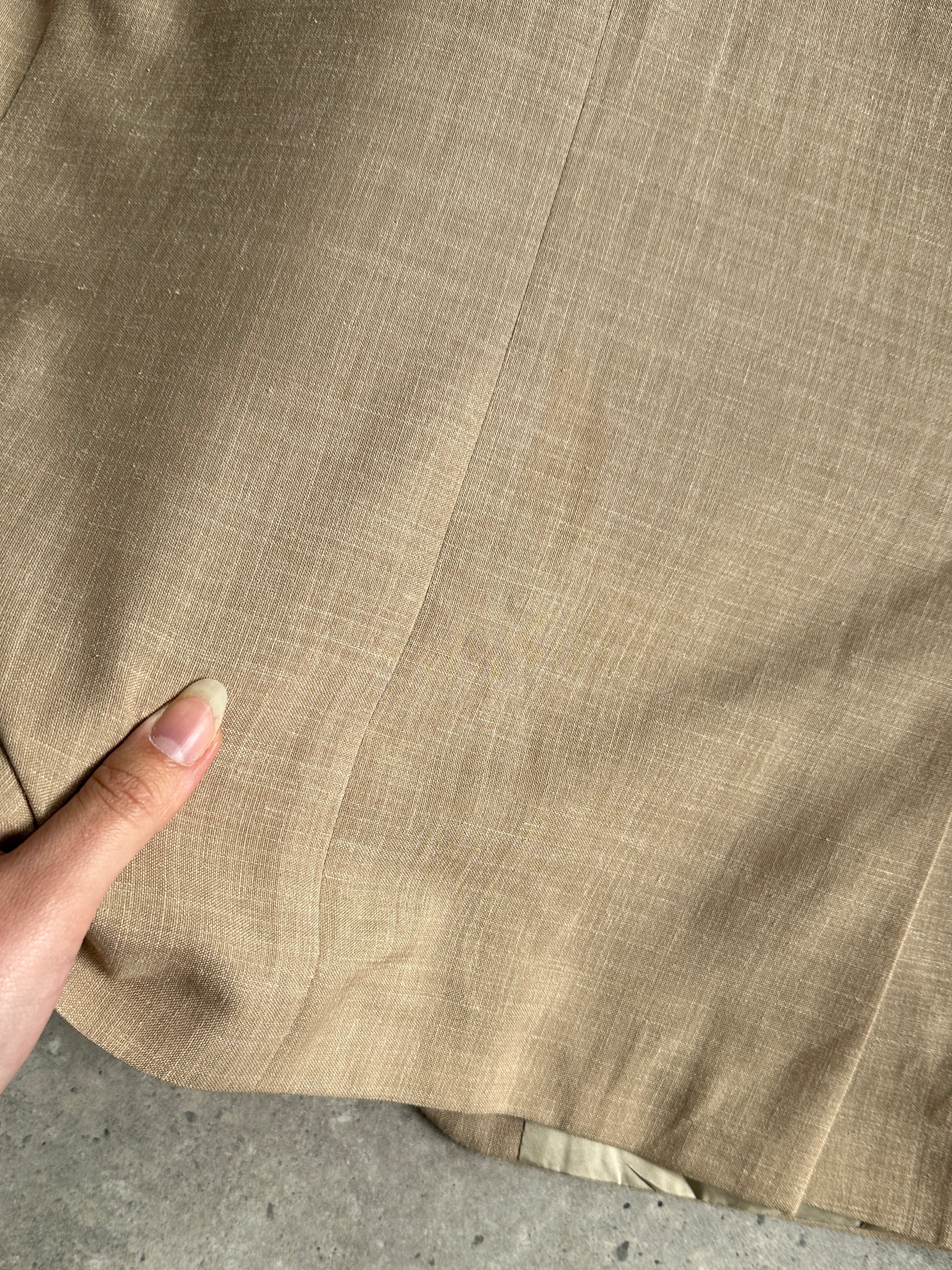 Vintage single-breasted wool linen blend jumpsuit in size 36R/W31, featuring a classic tailored fit and vintage styling.