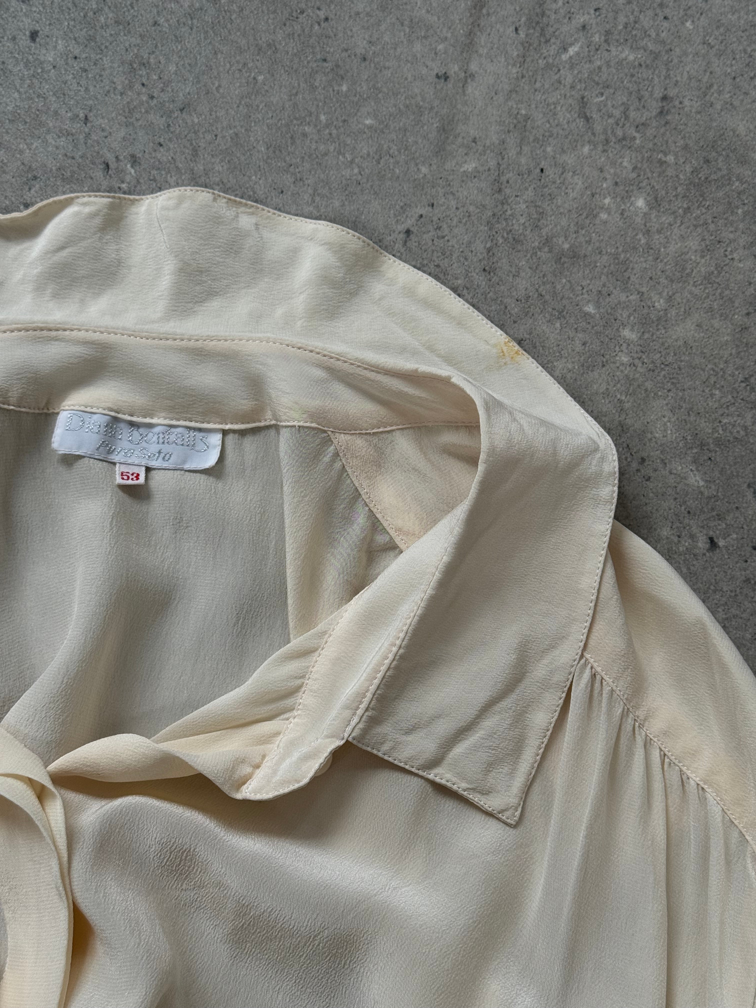 Vintage 1990s pure silk concealed placket shirt in size L/XL, featuring a classic and elegant design with a smooth silk fabric.