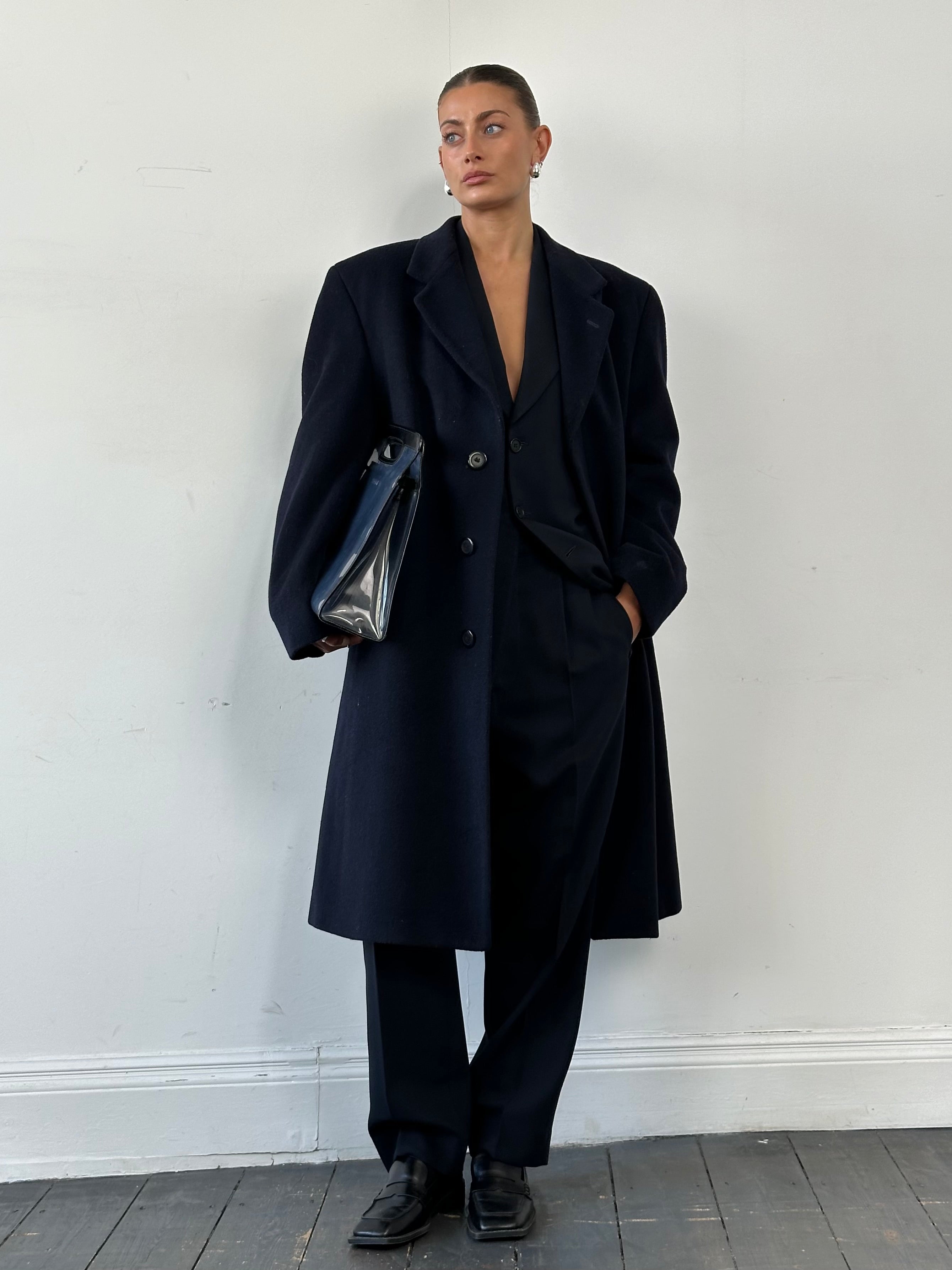 Vintage British wool and cashmere coat with concealed placket in size 42R/XL, classic and stylish outerwear for cold weather.