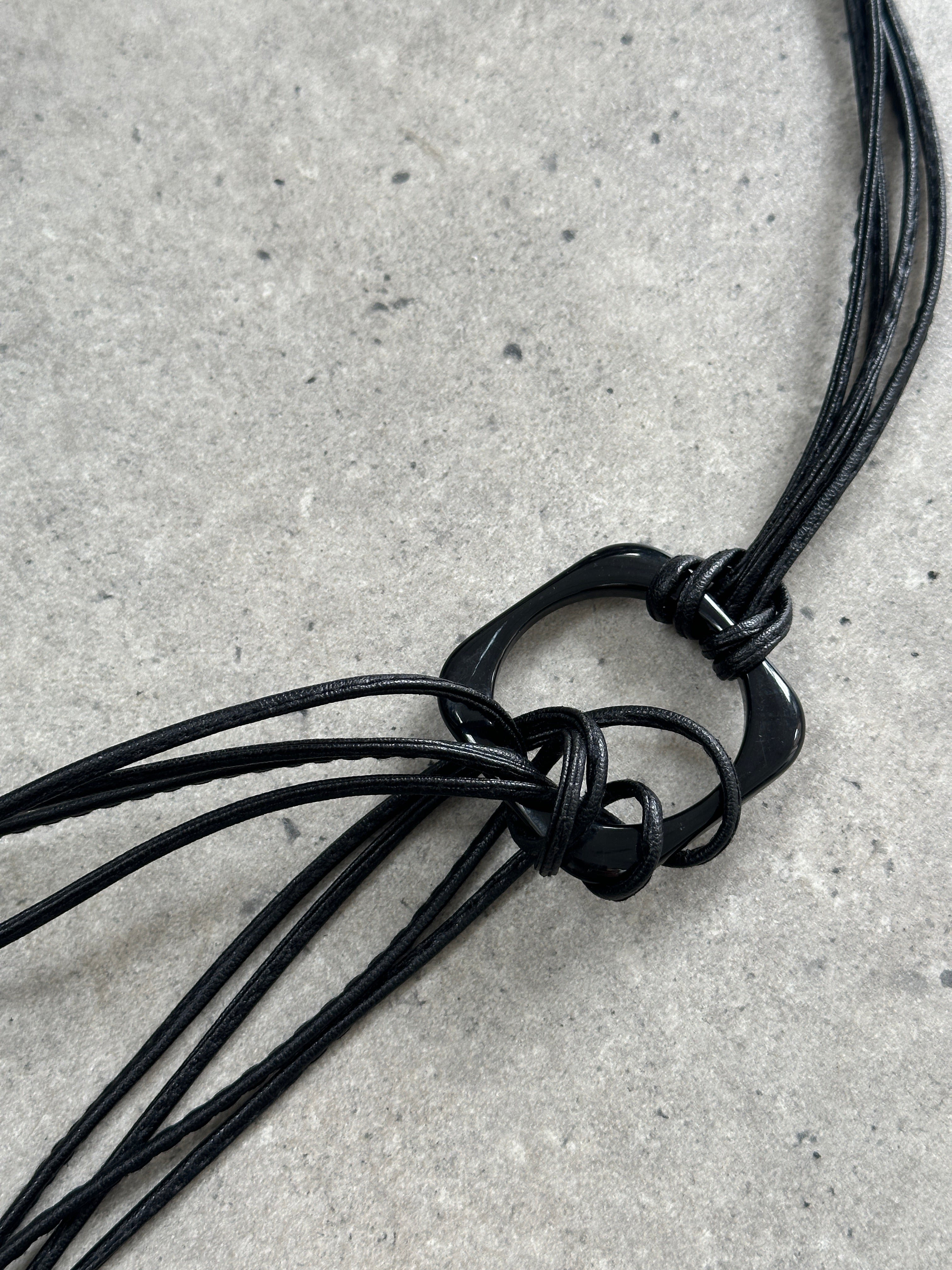 Vintage faux leather rope belt, one size, with rustic buckle and textured leather appearance, ideal for casual or vintage-inspired outfits.