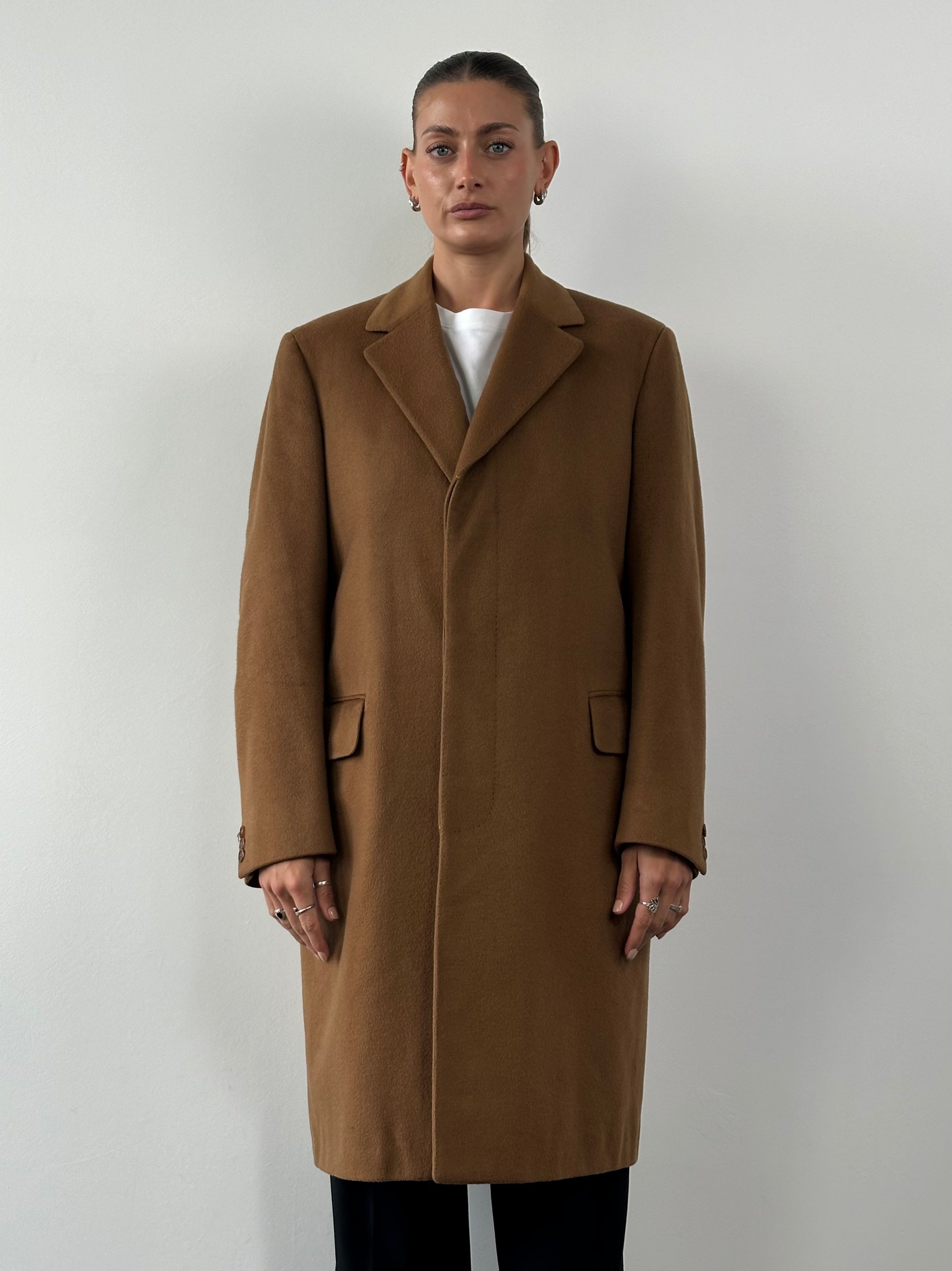 Vintage pure cashmere coat with concealed placket in size L/XL, featuring a classic design and soft, luxurious fabric.