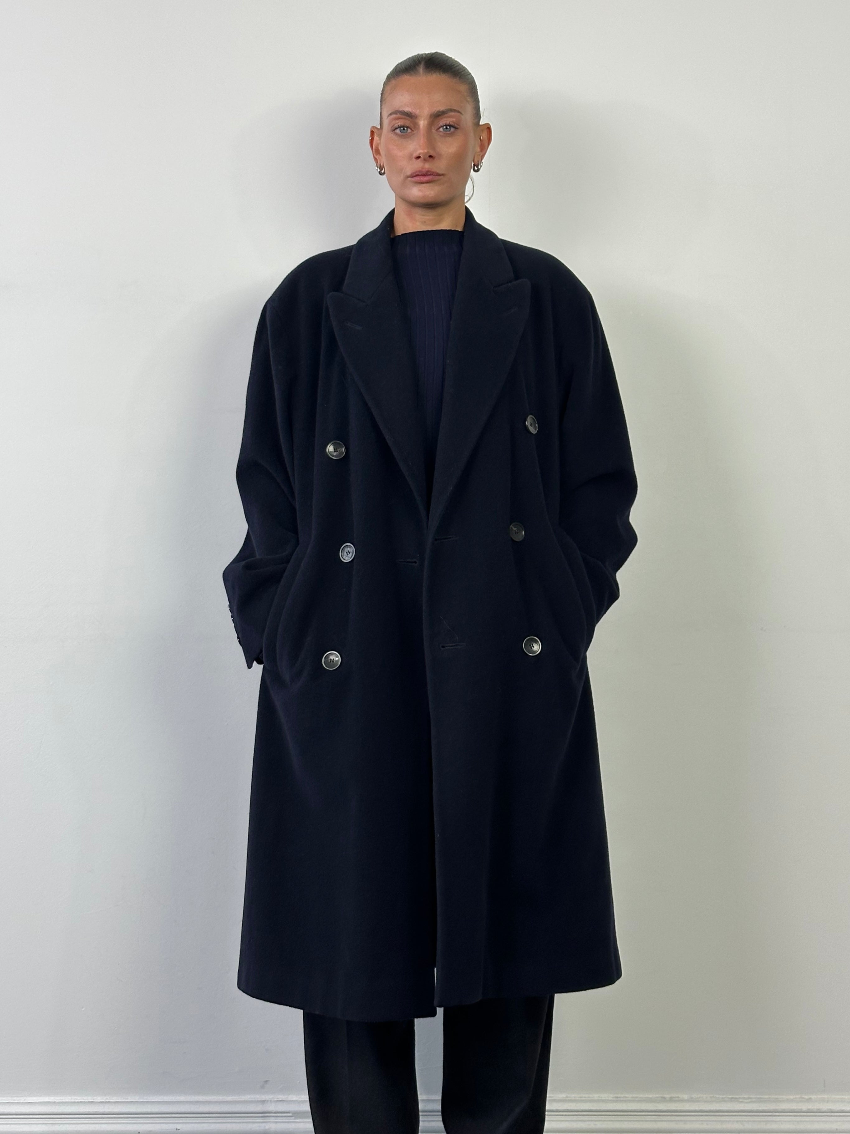 Vintage wool and cashmere double-breasted coat in XL, featuring classic design and textured fabric, displayed on a hanger.