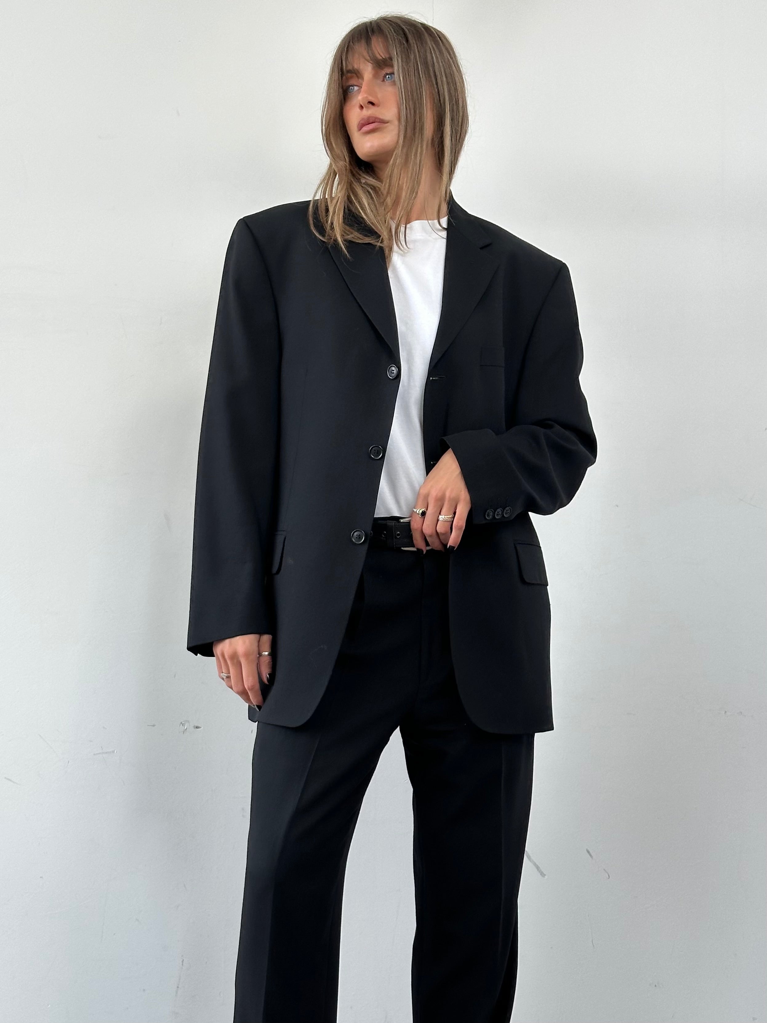 Pierre Cardin pure wool single-breasted suit jumpsuit in size 40R/W33, featuring a tailored fit and classic lapel design.