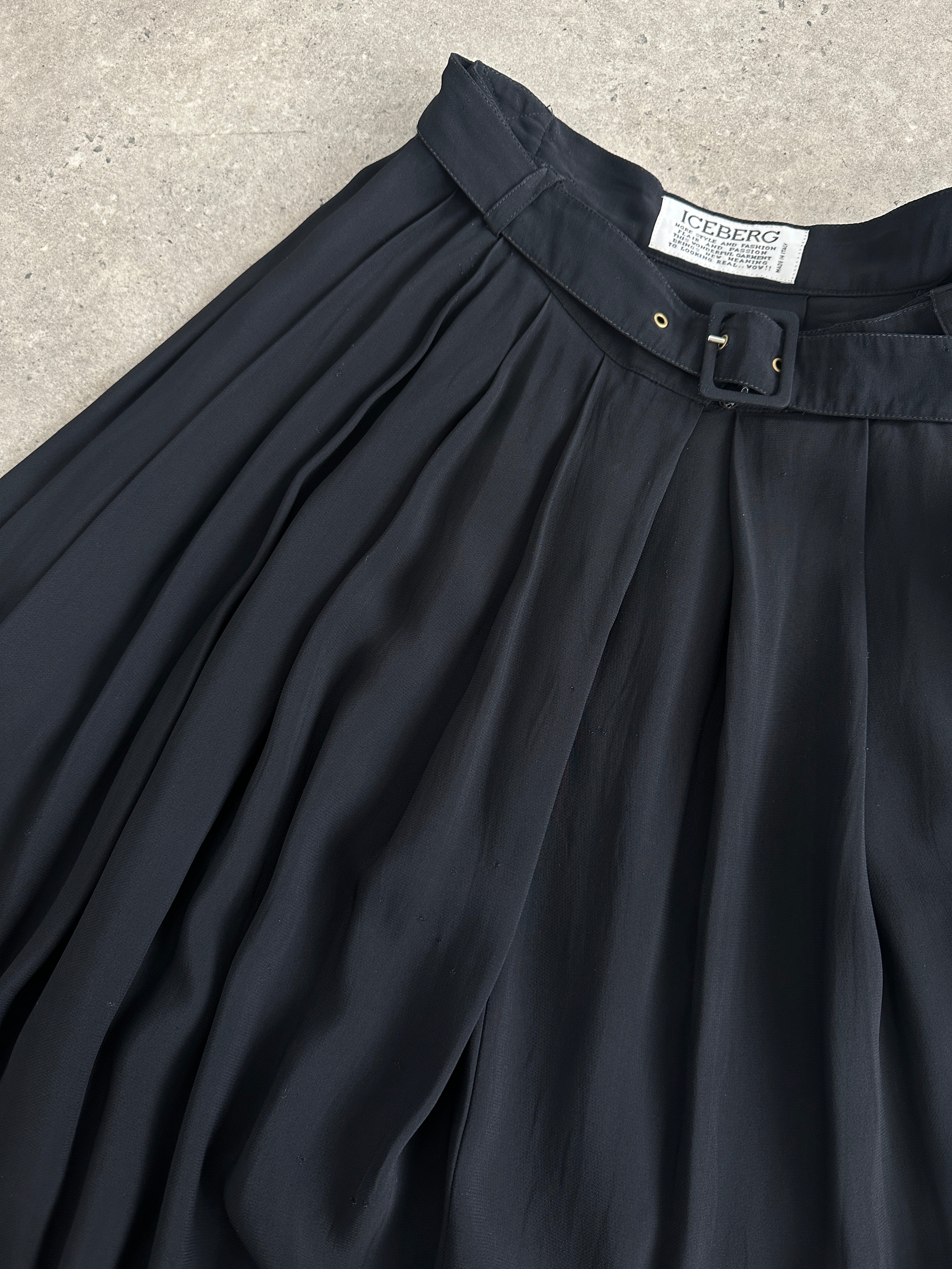 Iceberg pleated belted midi skirt in W28, featuring a flowy design and waist belt, displayed on a neutral background.