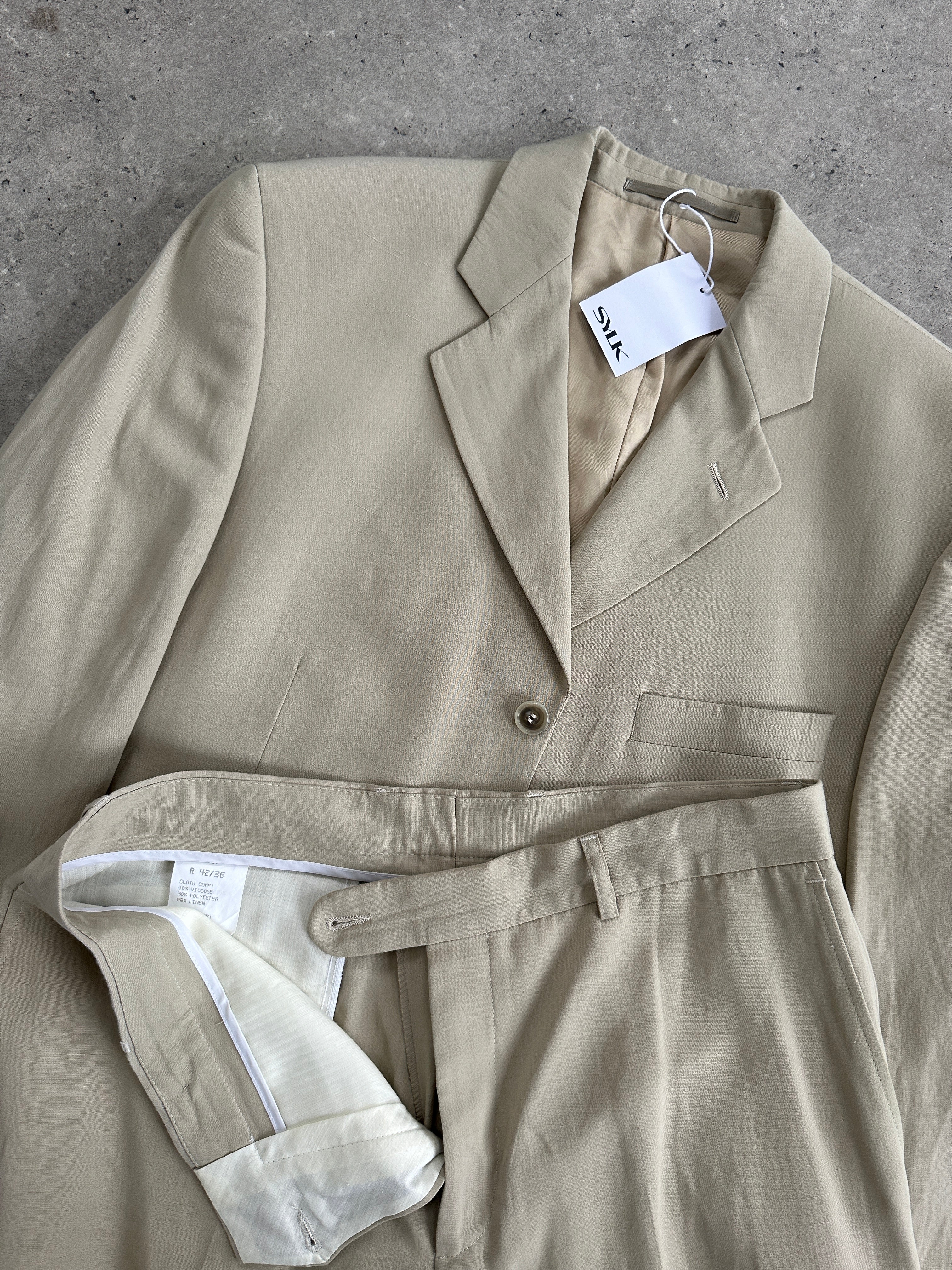 Vintage linen blend single-breasted jumpsuit in size 42R/W34, featuring classic tailoring and a vintage-inspired design.