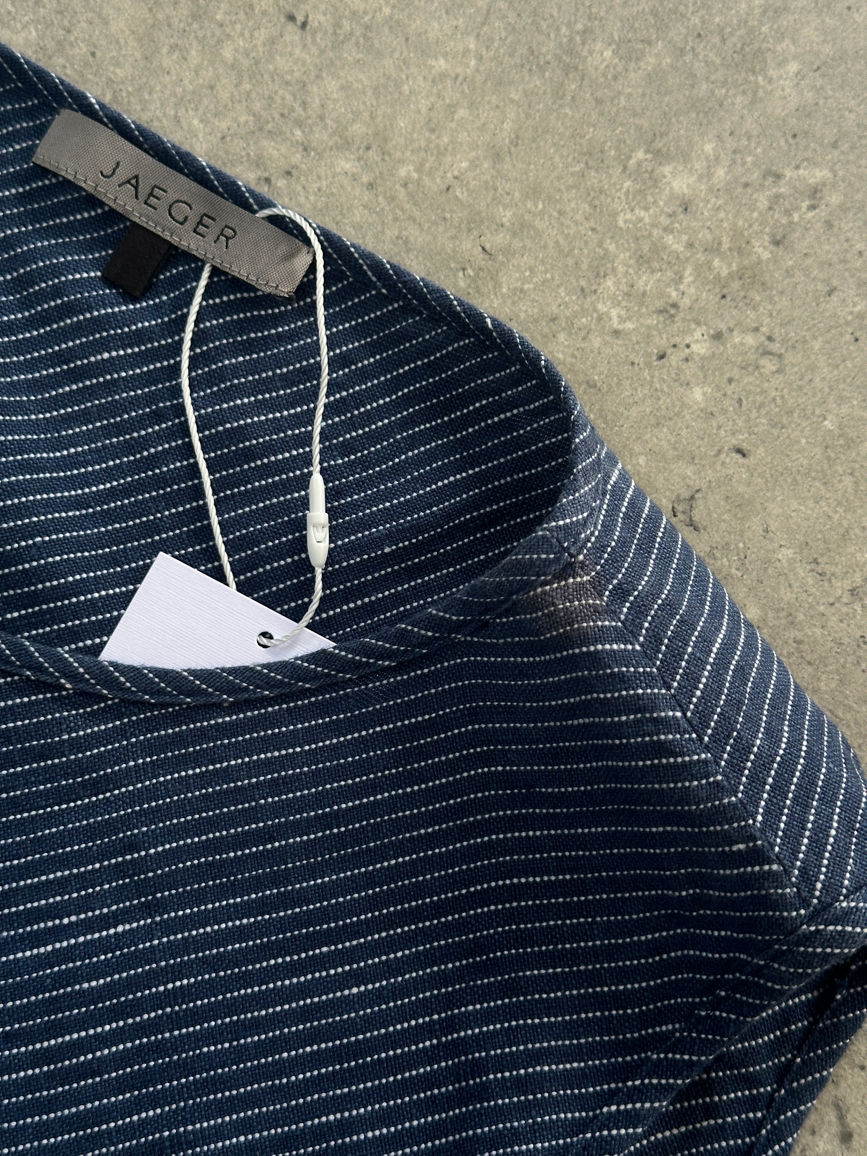 Jaeger pure linen stripe two-piece skirt and top set, showcasing the skirt and matching top in a natural linen fabric.