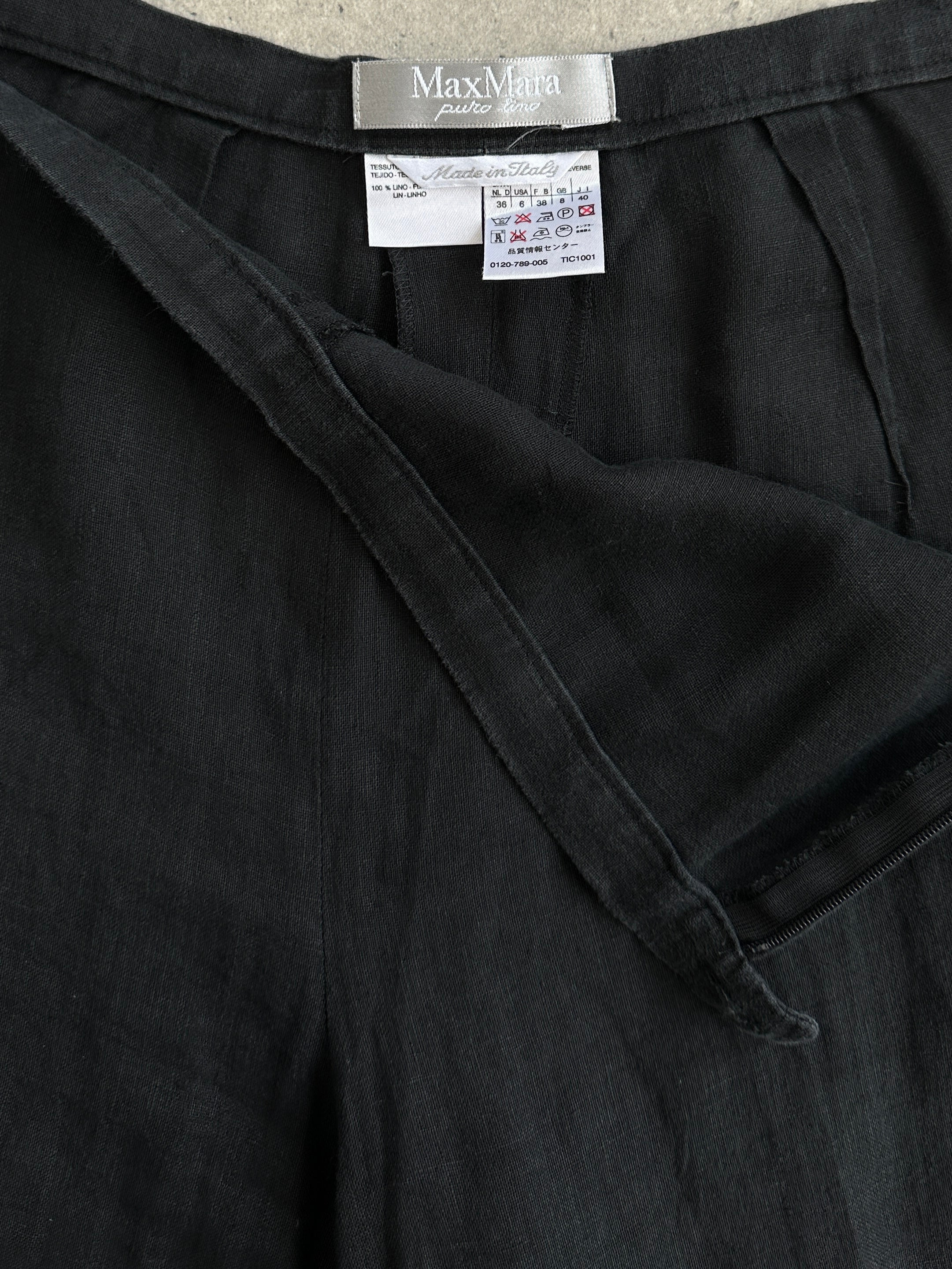 Max Mara pure linen mid waist casual trousers in beige, featuring a minimalist design and tailored fit.