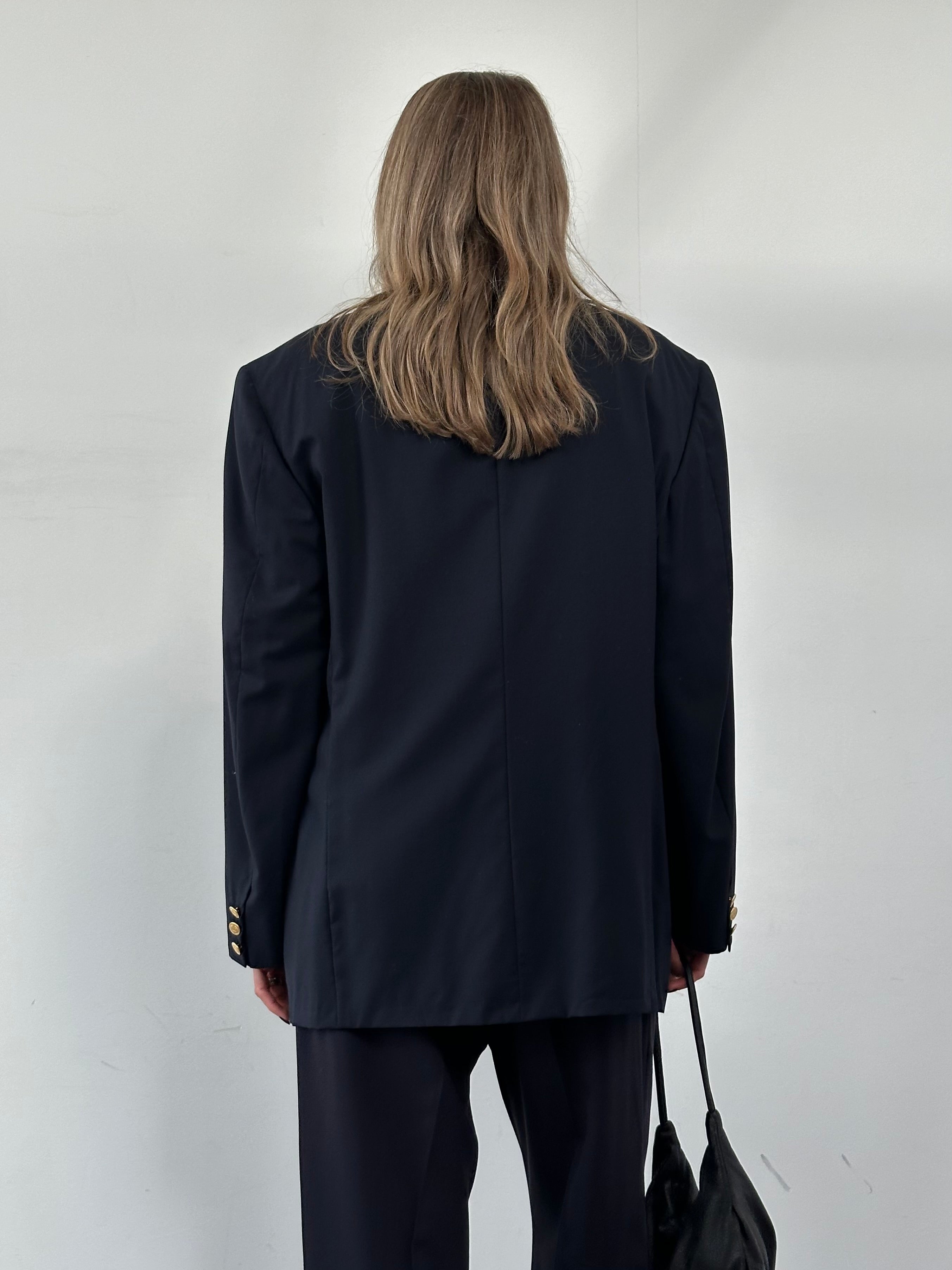 Valentino pure wool double-breasted blazer in size 42R/XL, tailored fit with classic lapels and button details.