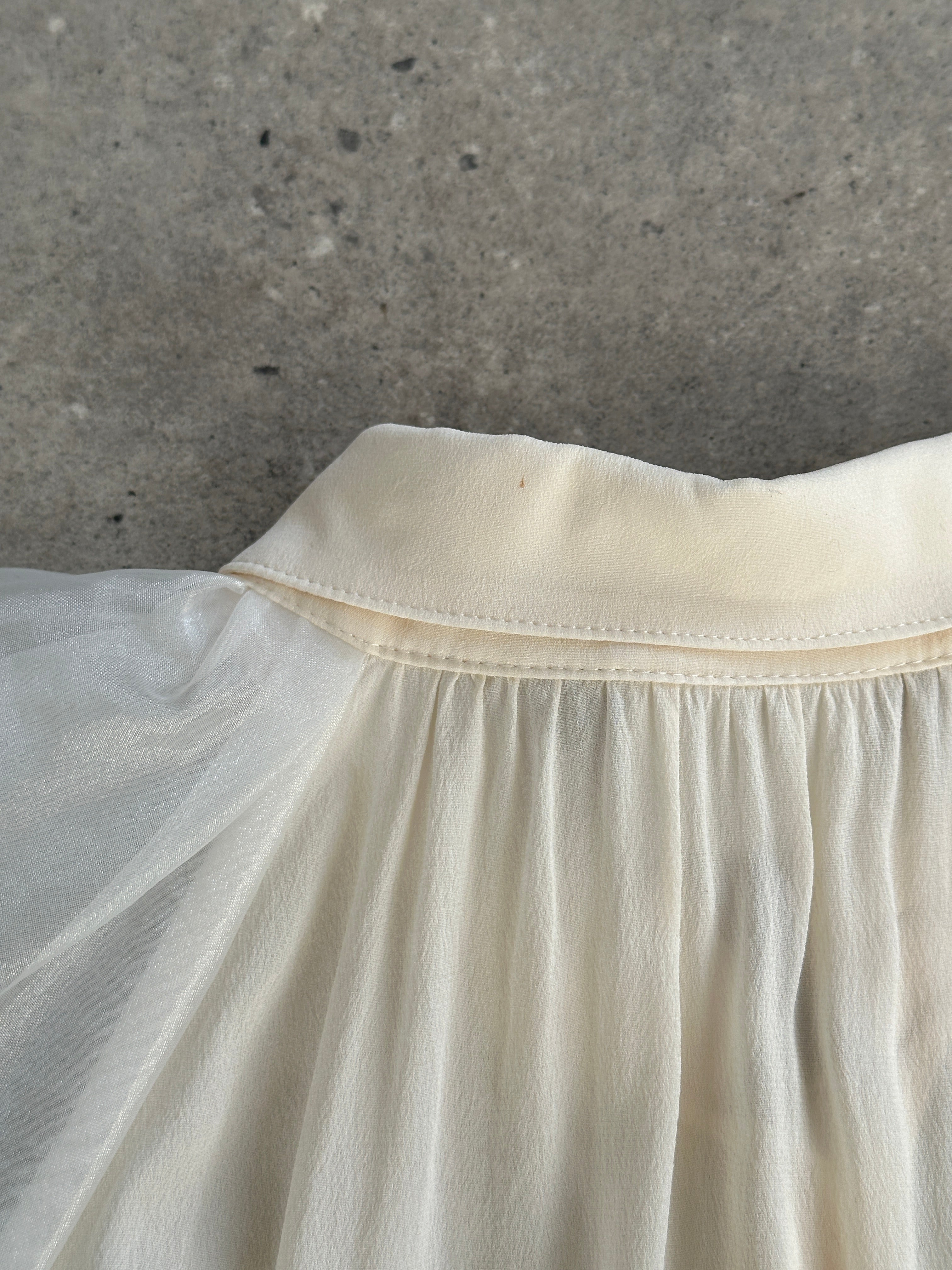 Dolce & Gabbana pure silk puff sleeve shirt in XS/S, featuring elegant design and soft silk fabric.