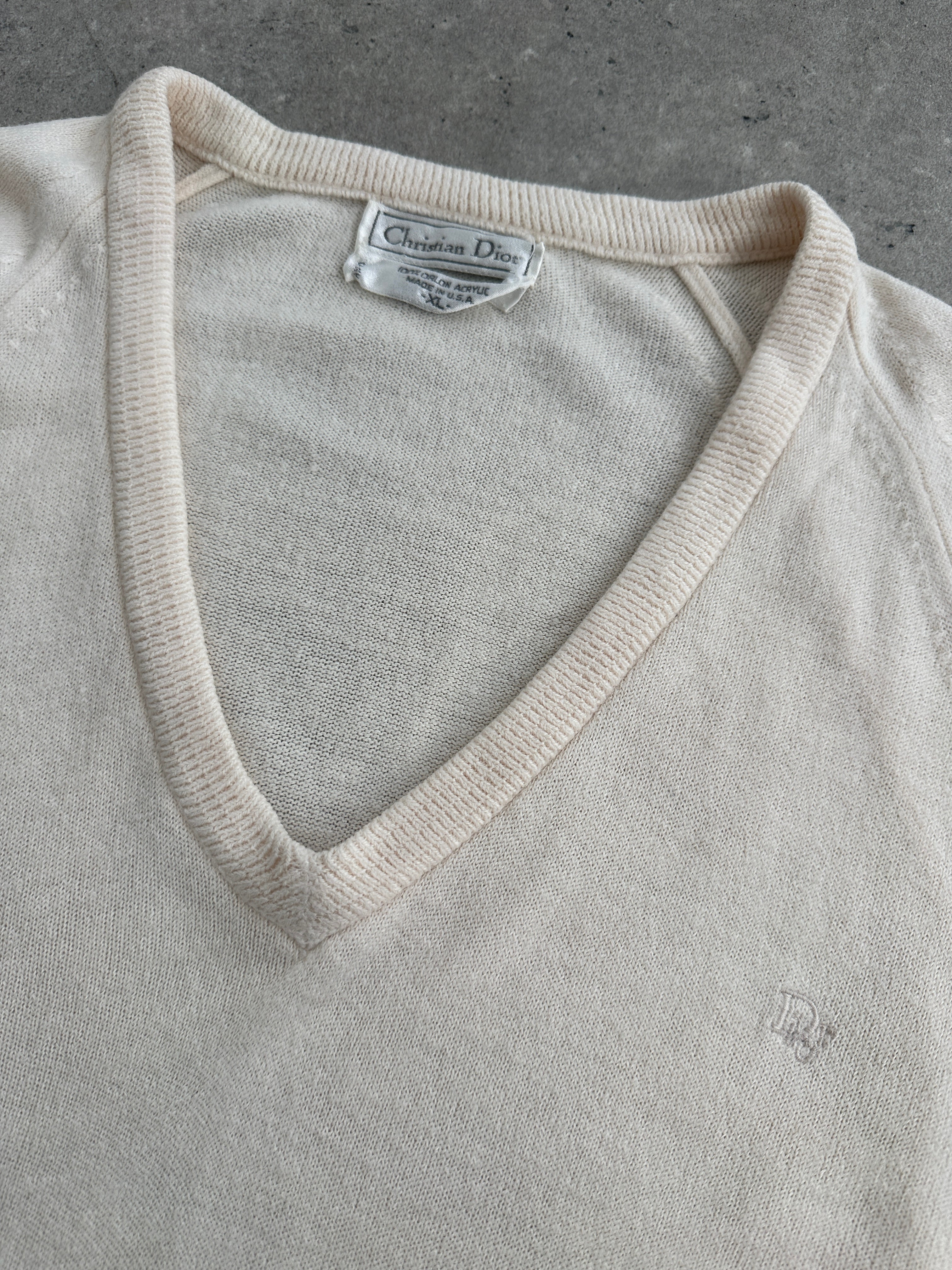 Christian Dior V neck logo knitted jumper in XL, featuring a classic design with the Dior logo on a cozy, stylish knit fabric.