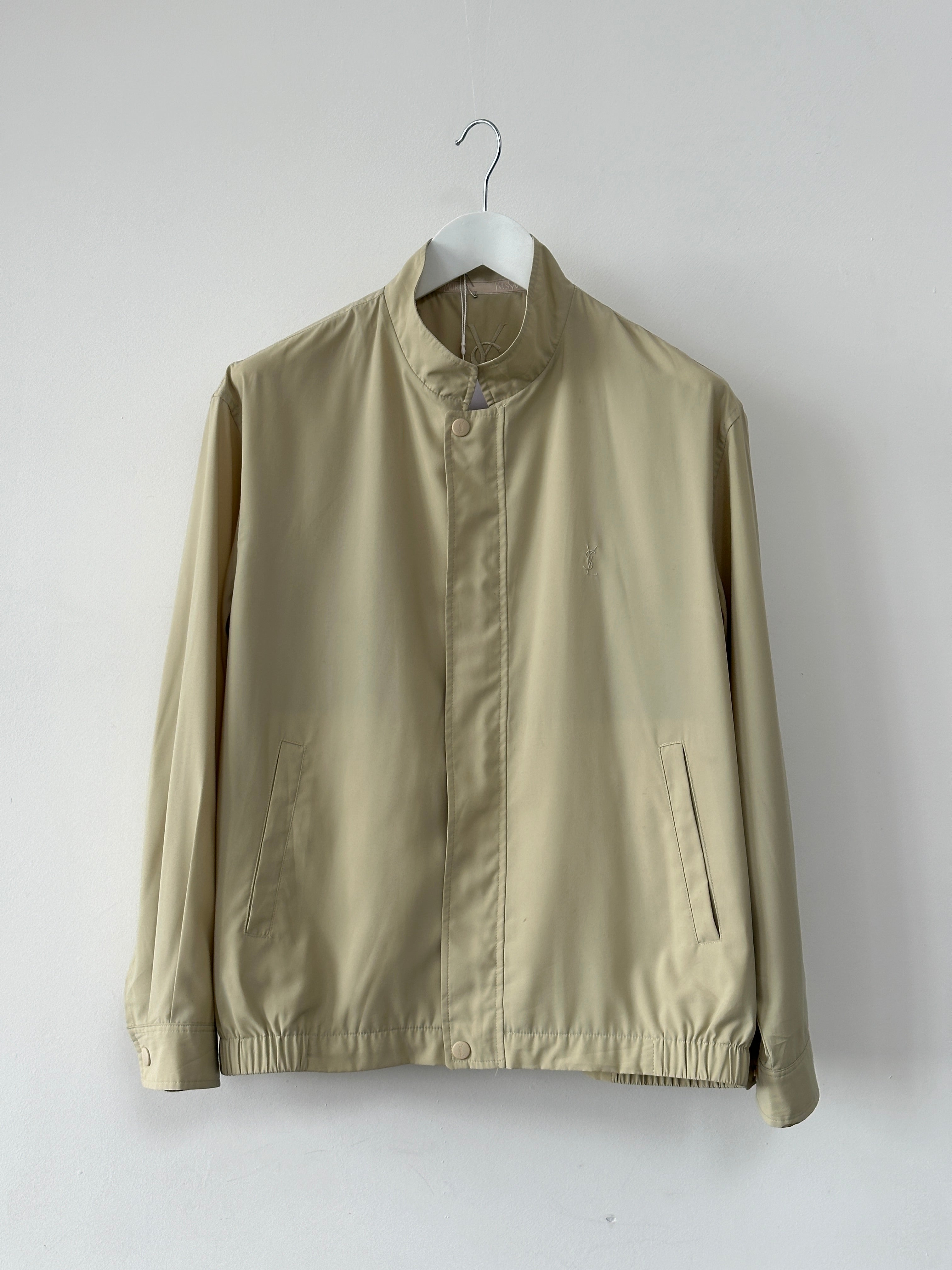 Yves Saint Laurent Pour Homme logo bomber jacket in black, displaying the front with YSL branding and sleek design.
