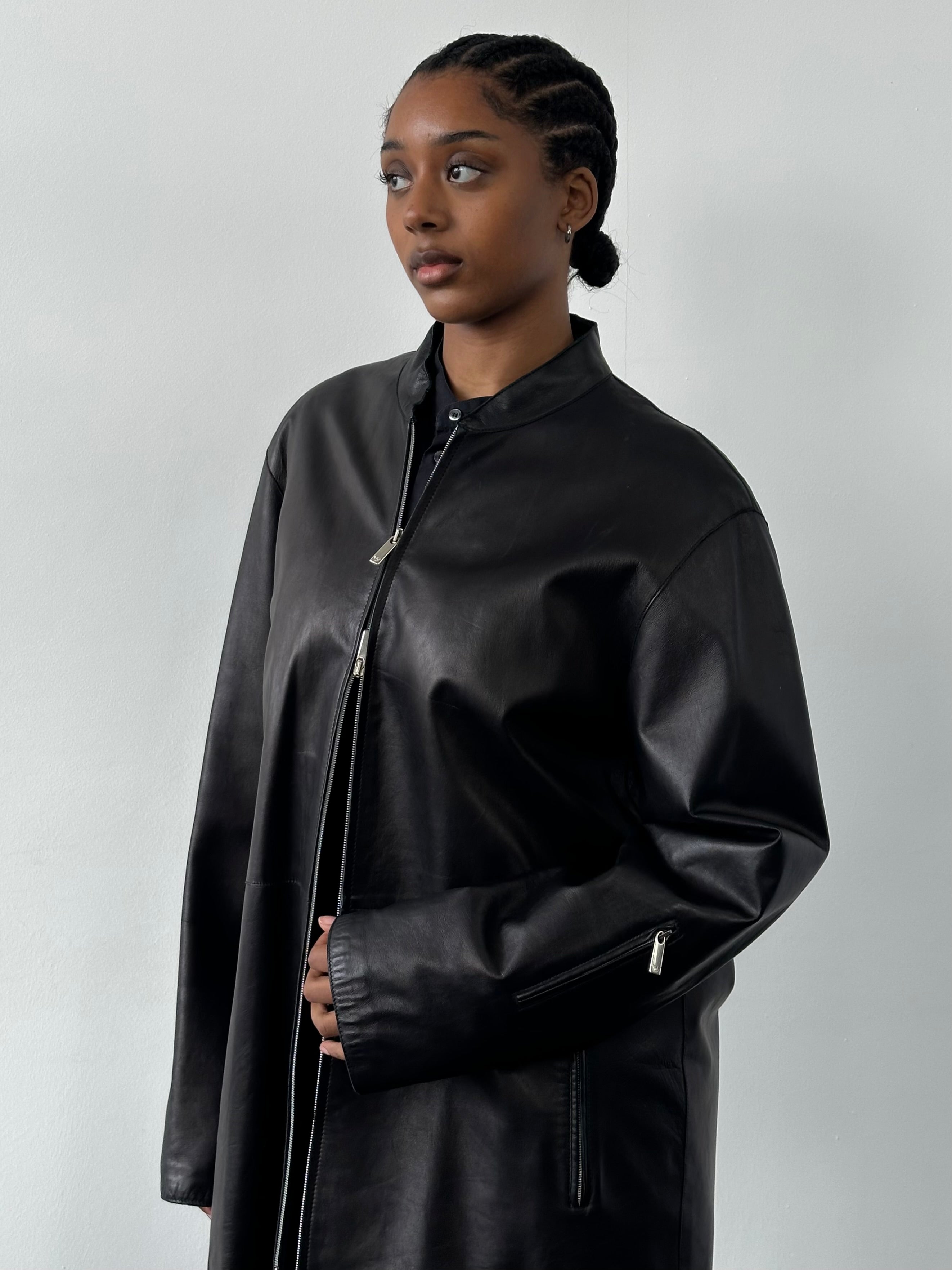 Emporio Armani 2000s XL leather jacket with double zip design, featuring sleek black leather and modern style.