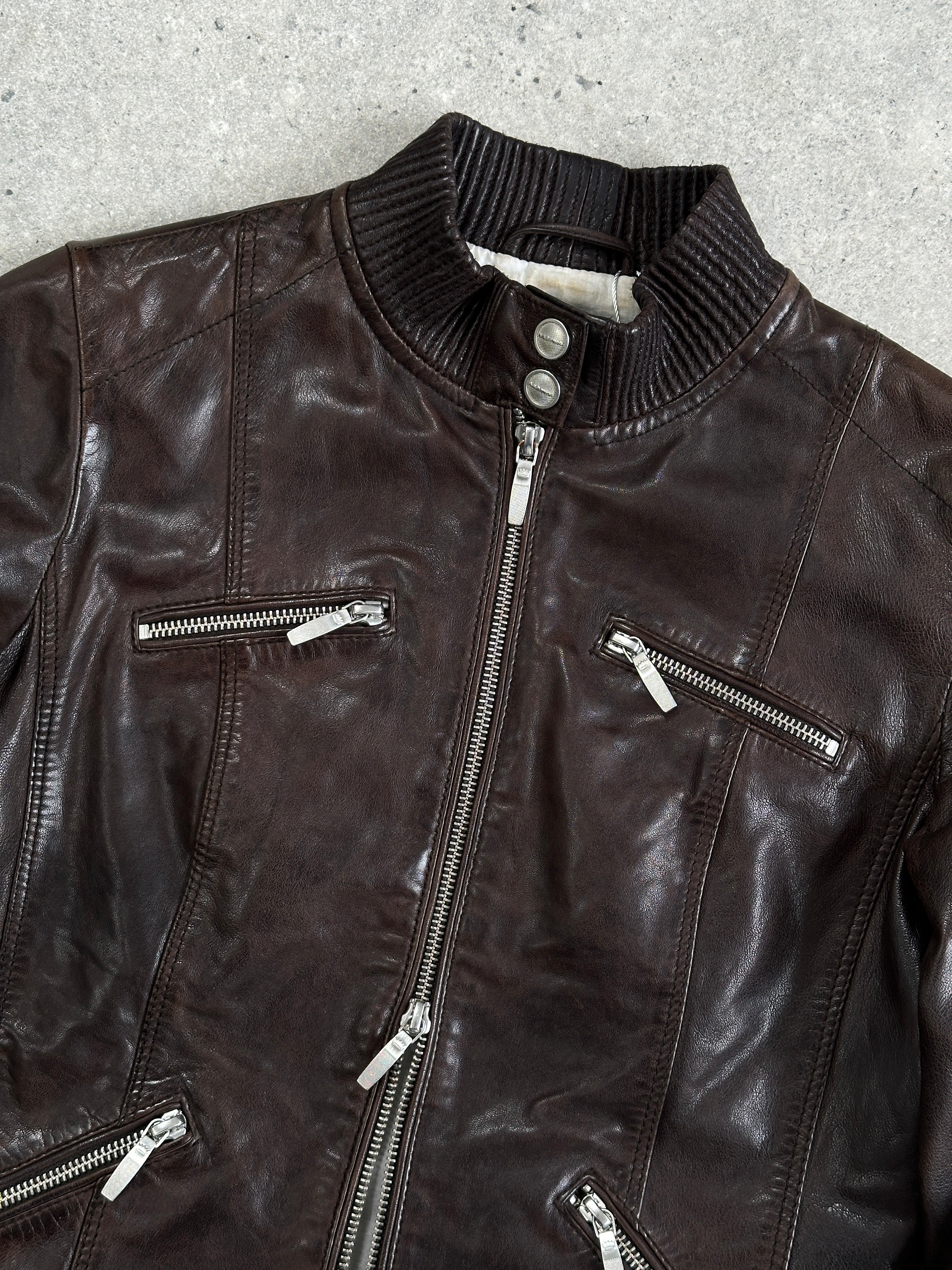 Vintage double zip fitted biker leather jacket in XS/S, showcasing classic style with double zippers and sleek design.