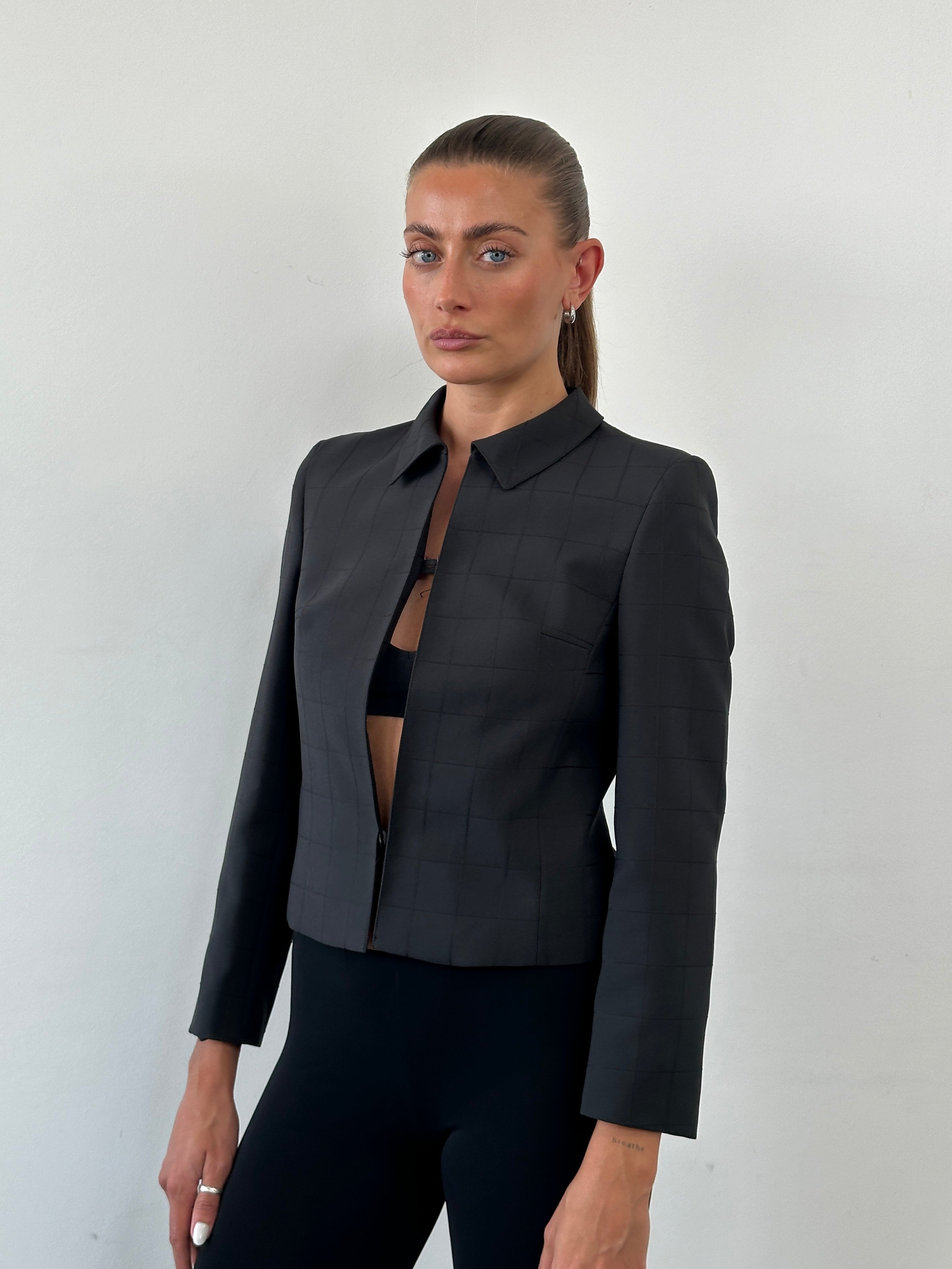 Vintage 80s minimal cropped check blazer, stylish vintage blazer with a tailored fit and classic check pattern in natural light.