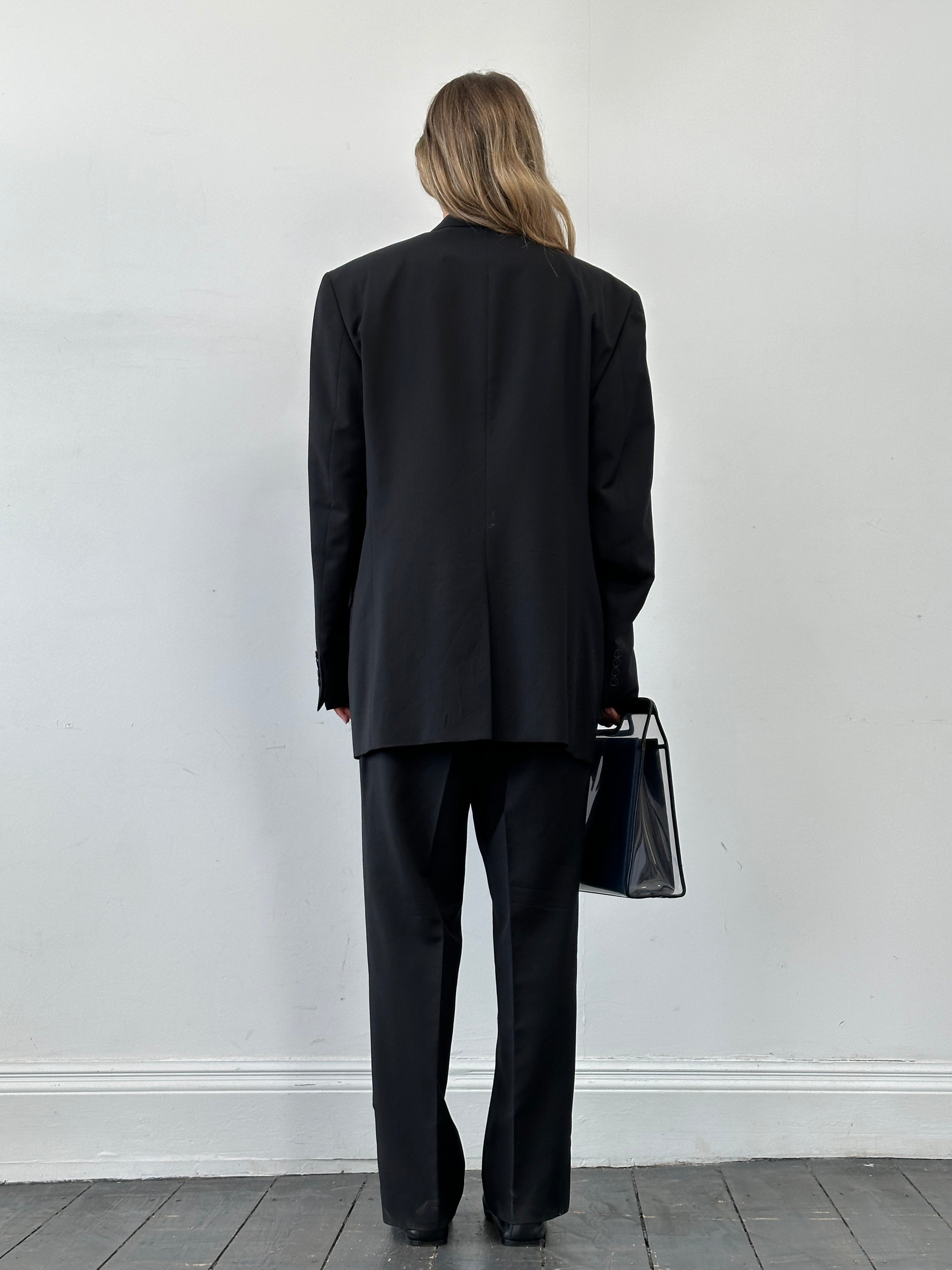 Yves Saint Laurent Pour Homme pure wool single-breasted suit in size 46R/W38, shown on a hanger against a plain background.