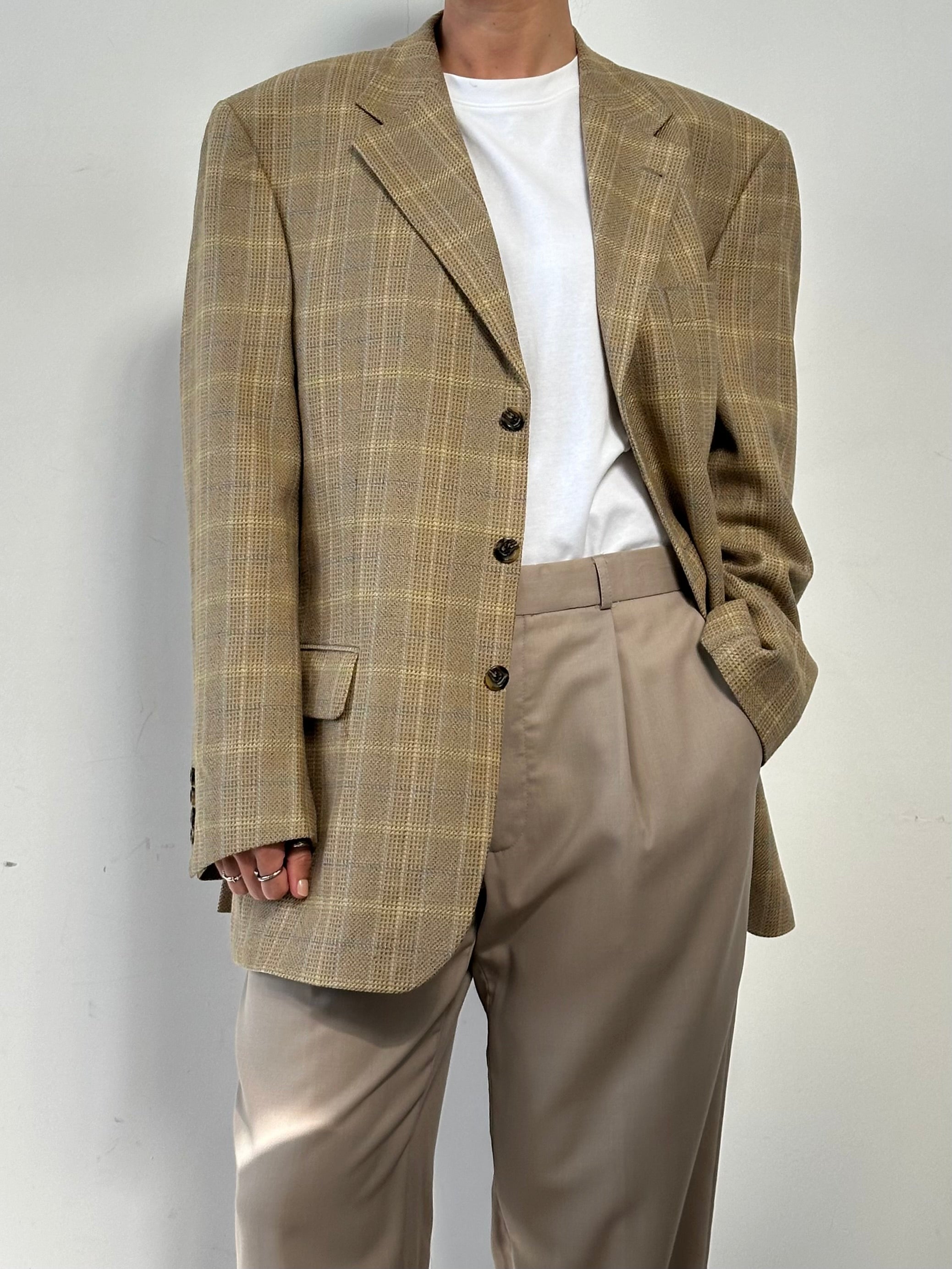 Yves Saint Laurent Pour Homme XXL check wool blazer with classic tailored fit and bold check pattern, front view.