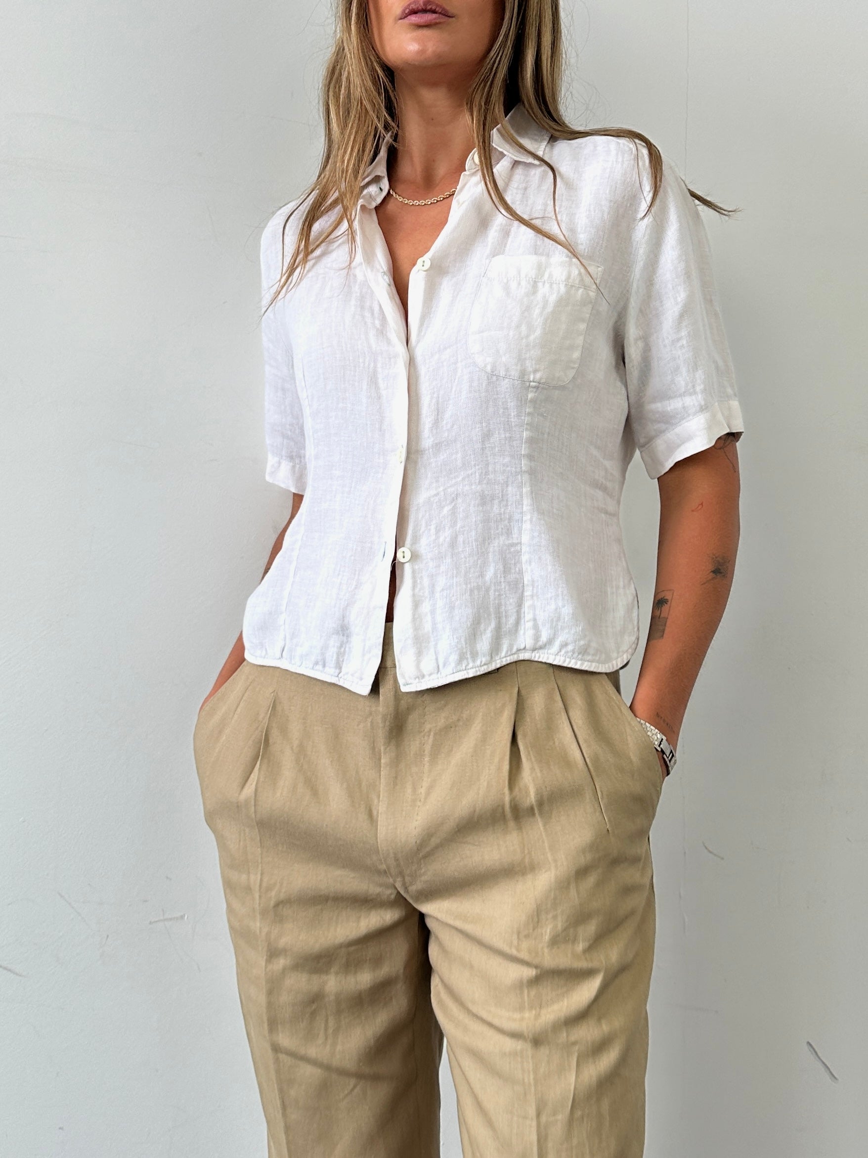 Max Mara pure linen shirt in S/M, shown in a light, breathable fabric with a classic collar and long sleeves.