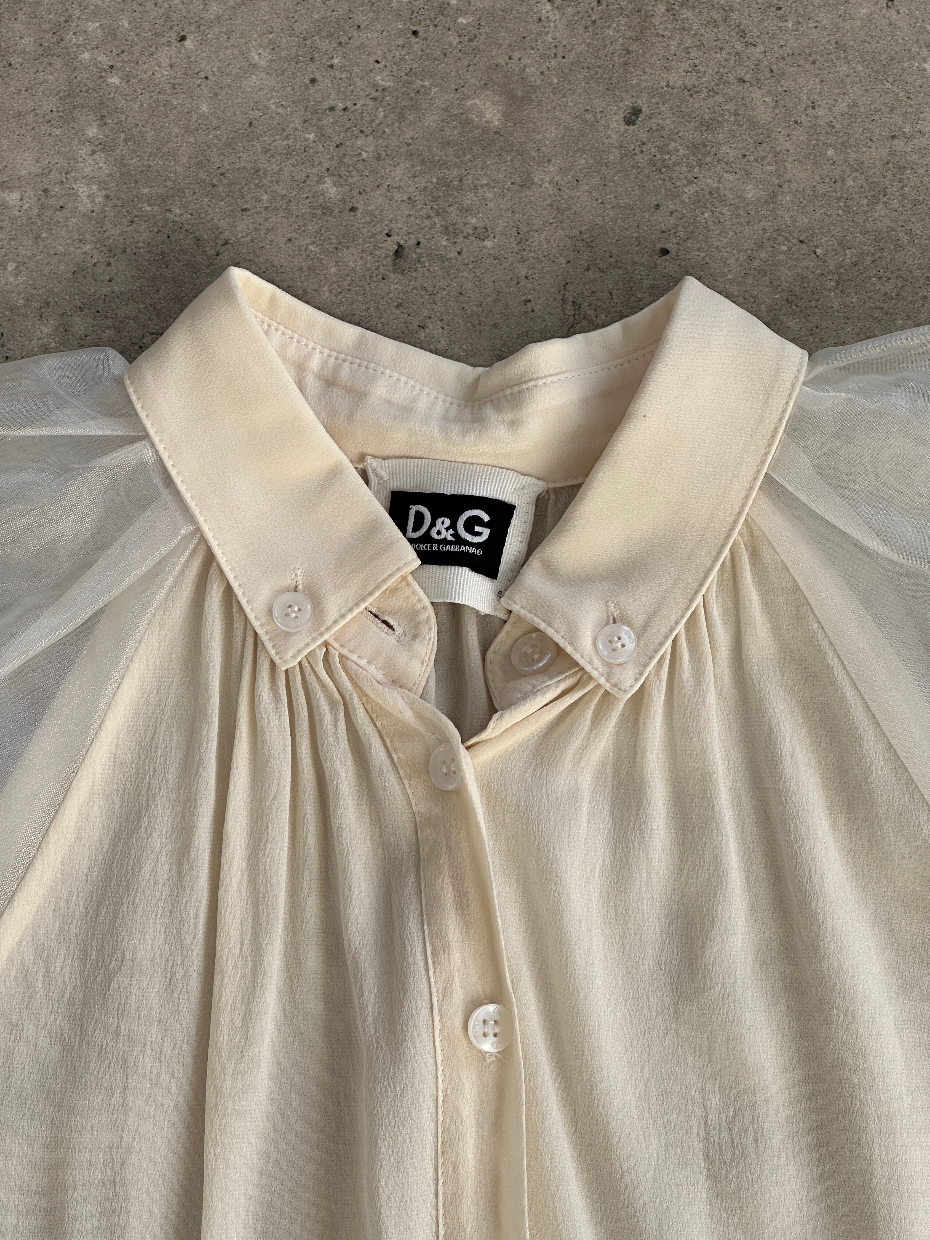Dolce & Gabbana pure silk puff sleeve shirt in XS/S, featuring a sophisticated design with structured puffed sleeves and elegant details.