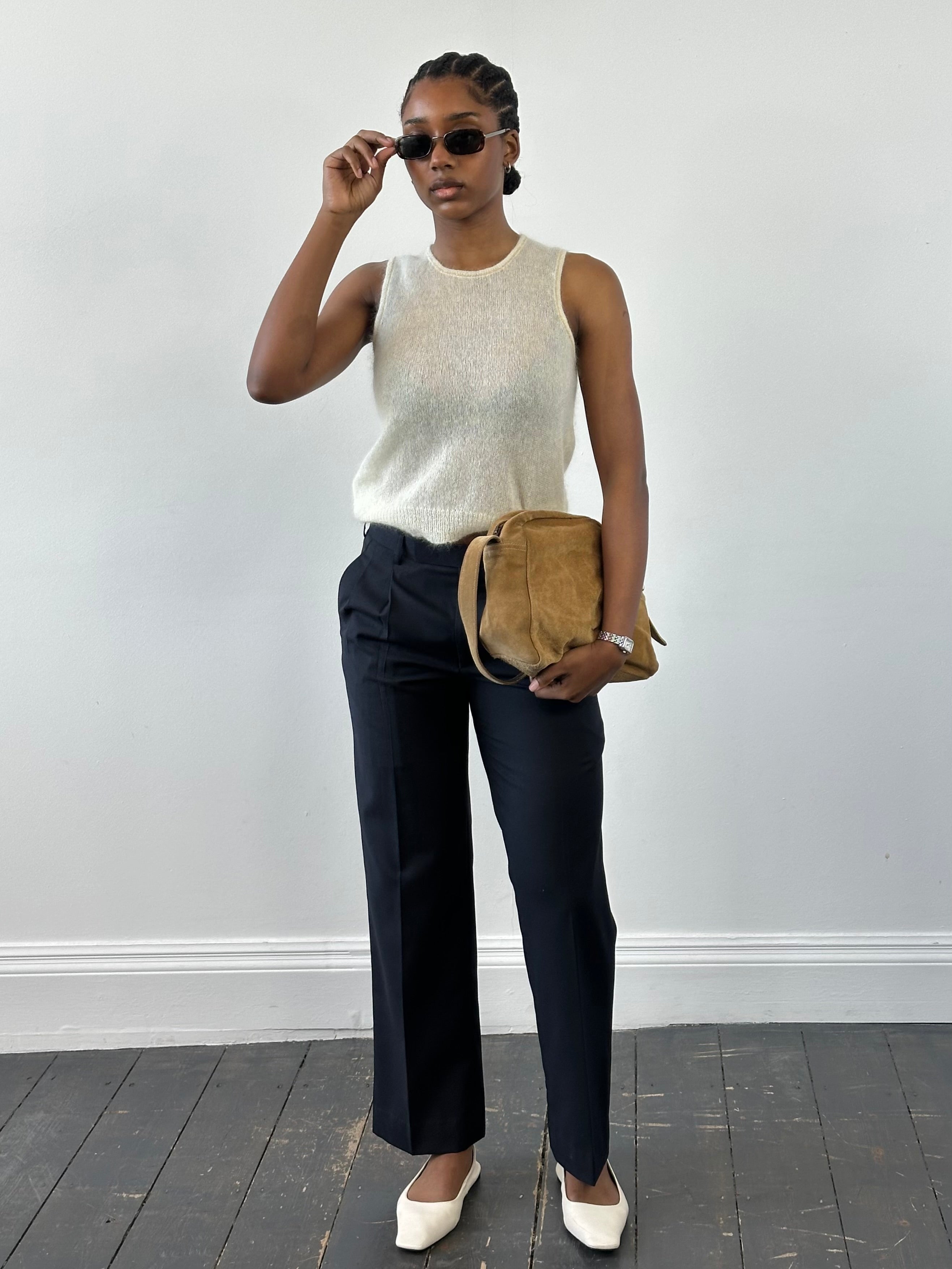 Vintage 2000s wool tailored trousers with pleats and straight leg fit, size W28, displayed on a neutral background.