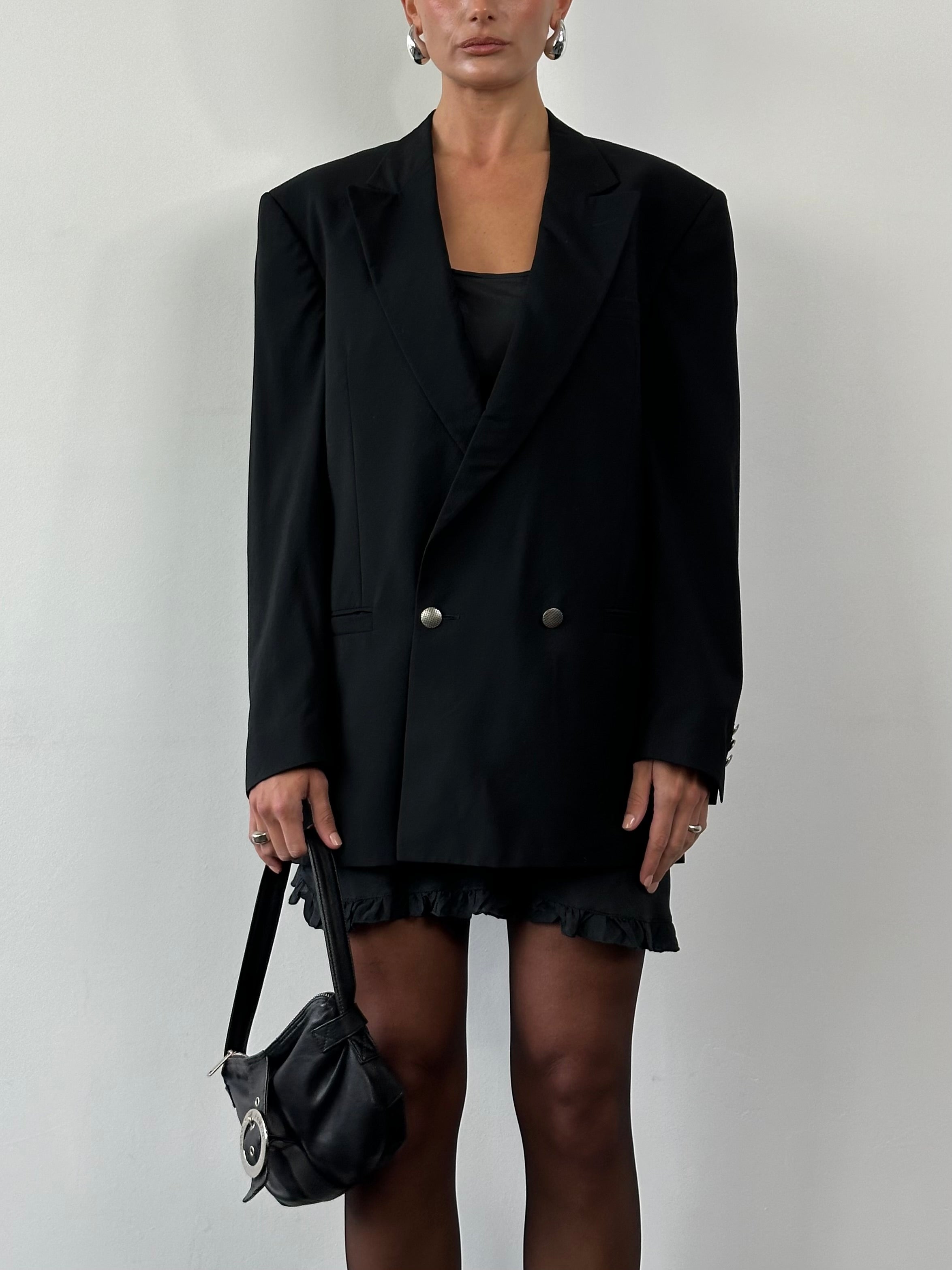 Versace Classic V2 pure wool double-breasted blazer in size L displayed on a hanger, featuring a tailored fit and elegant design.
