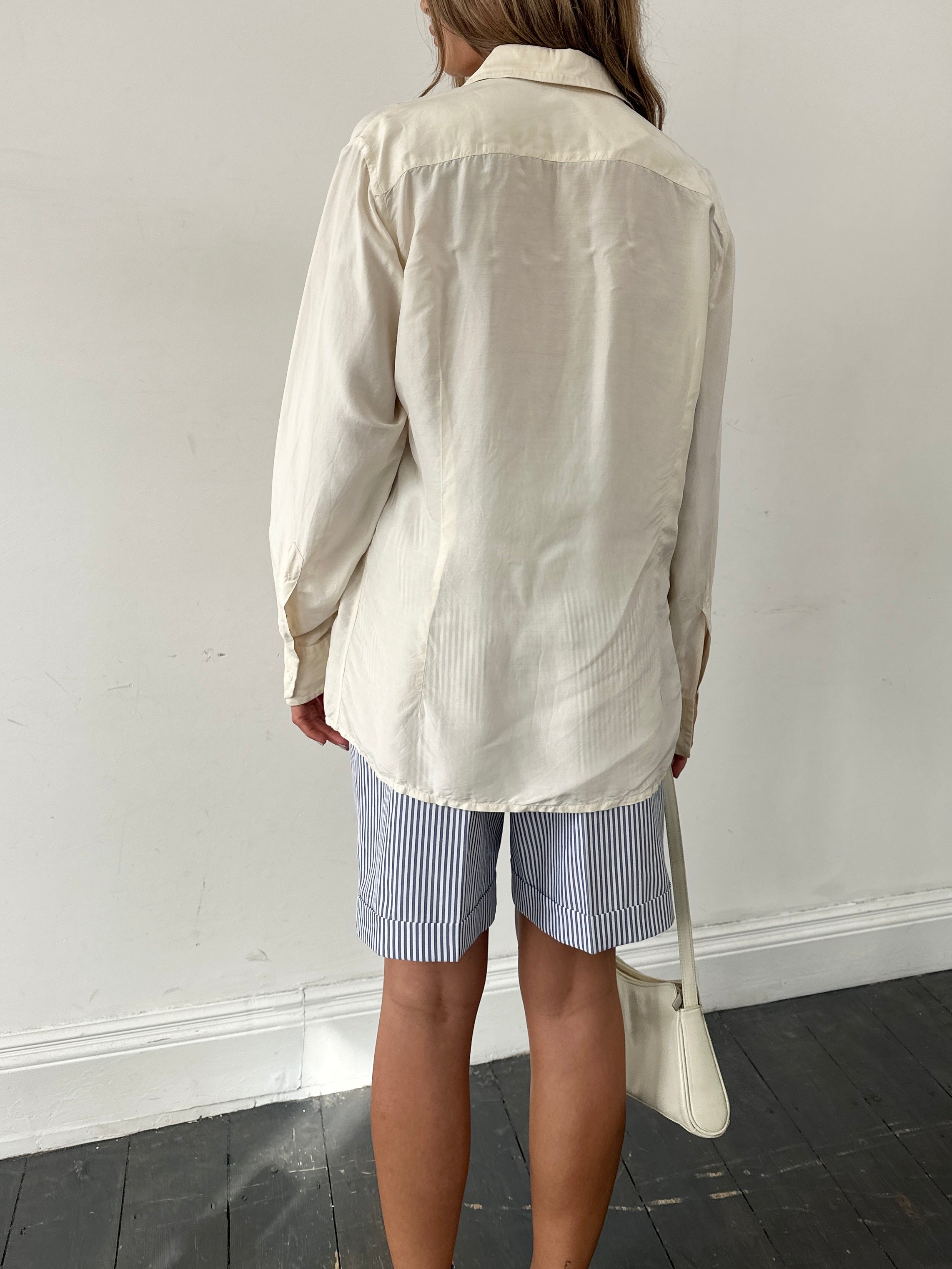 Vintage silk blend dagger collar shirt in size large, featuring a classic design with a sleek collar and elegant fabric.