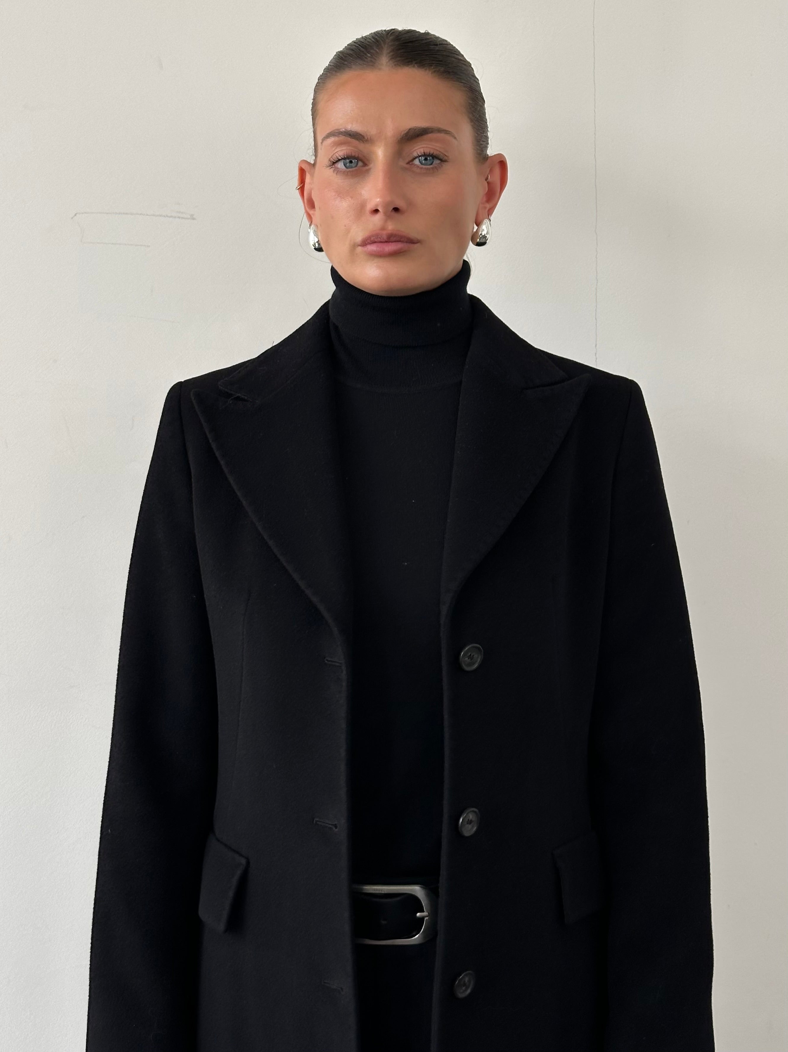 Max Mara pure wool single-breasted coat in size S displayed on a hanger, showcasing classic tailored design and neutral color.
