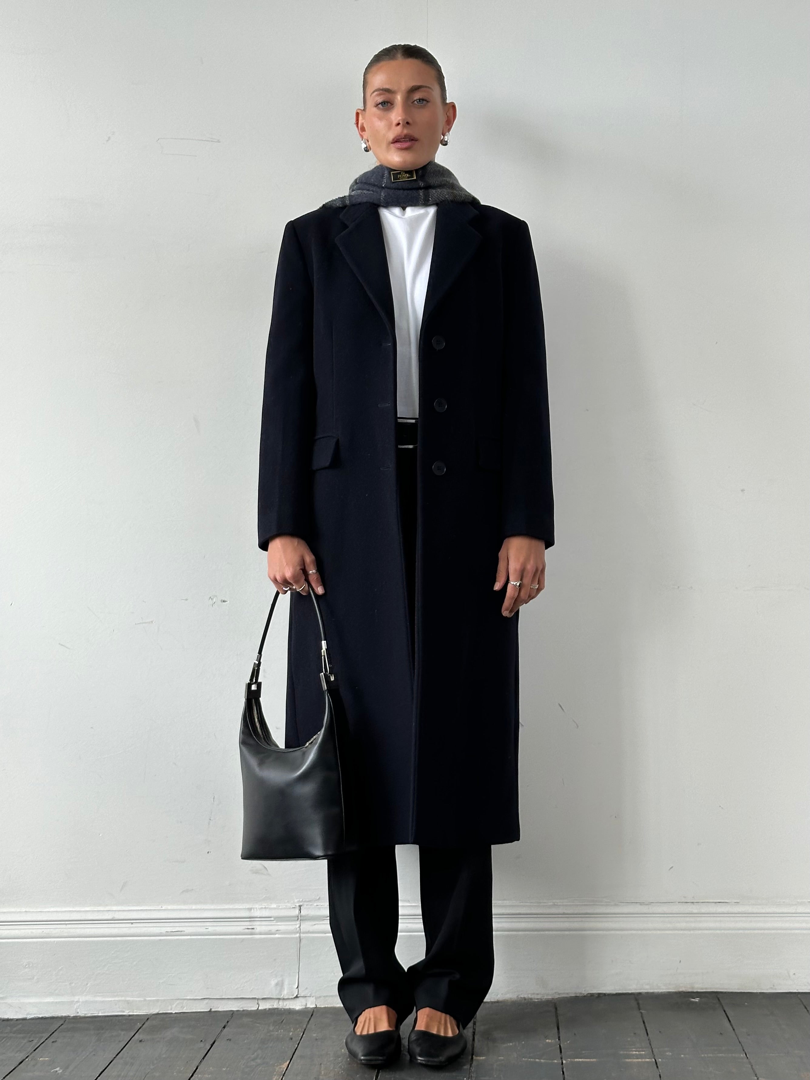 Emporio Armani pure wool single-breasted coat in size M, shown on a hanger with a classic tailored fit and neutral color.