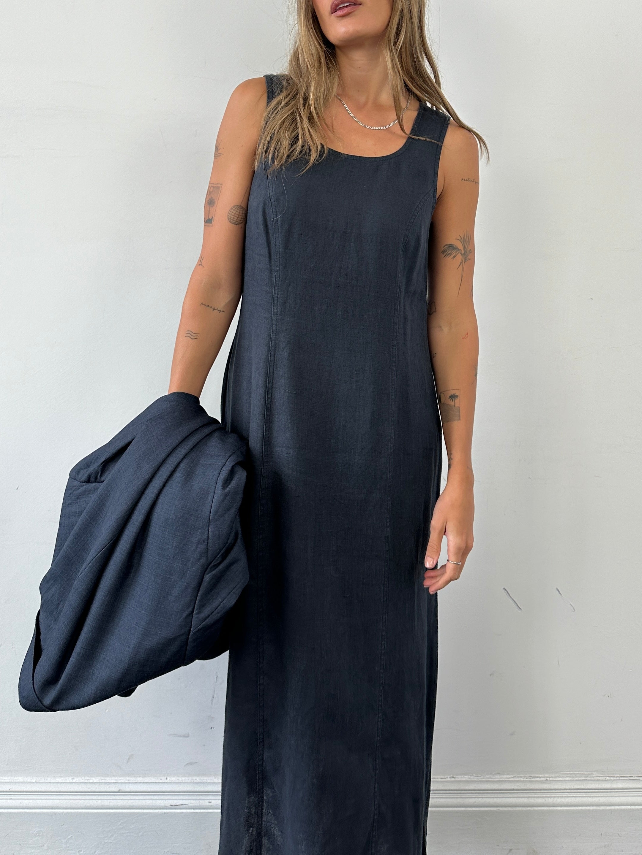 Vintage linen side split slip dress in size M, featuring a classic vintage design with a relaxed fit and delicate fabric.