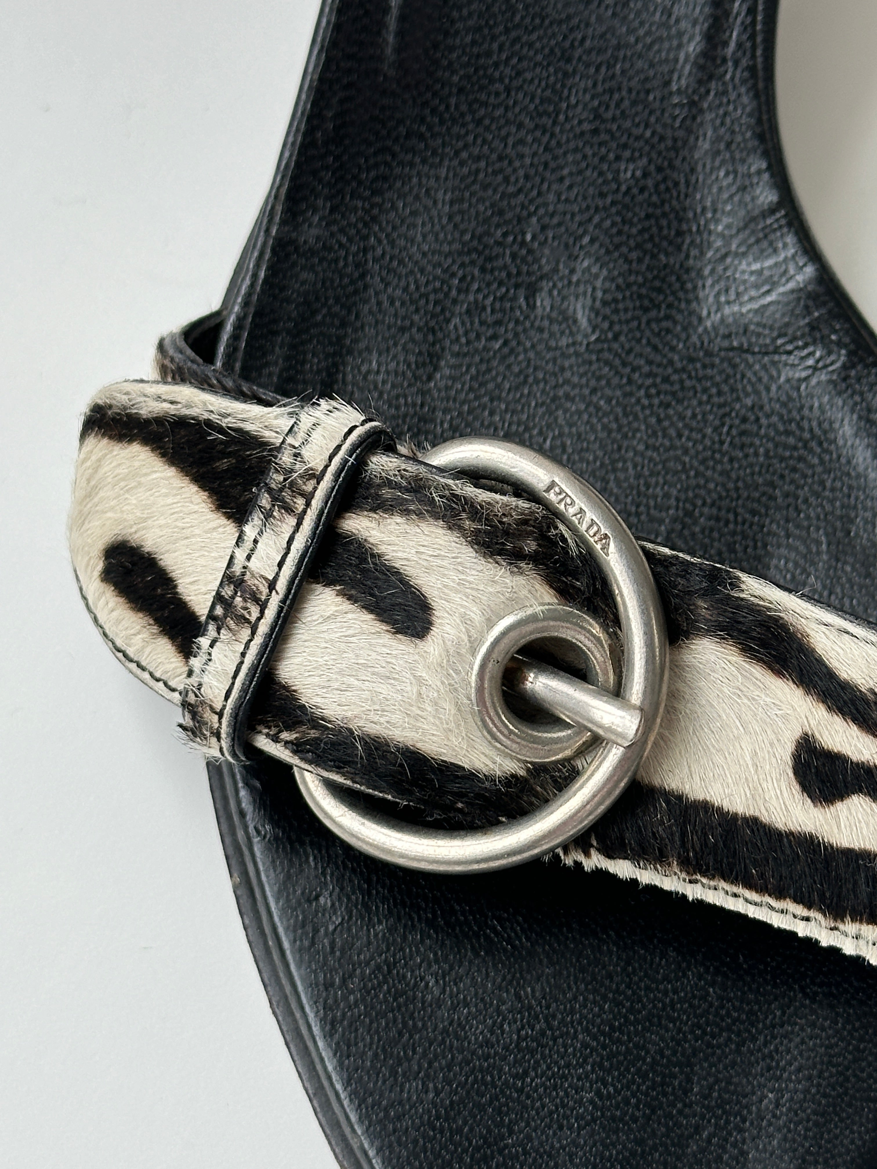 Prada zebra pony hair kitten heels in UK 4.5, featuring sleek pointed toes and elegant design.