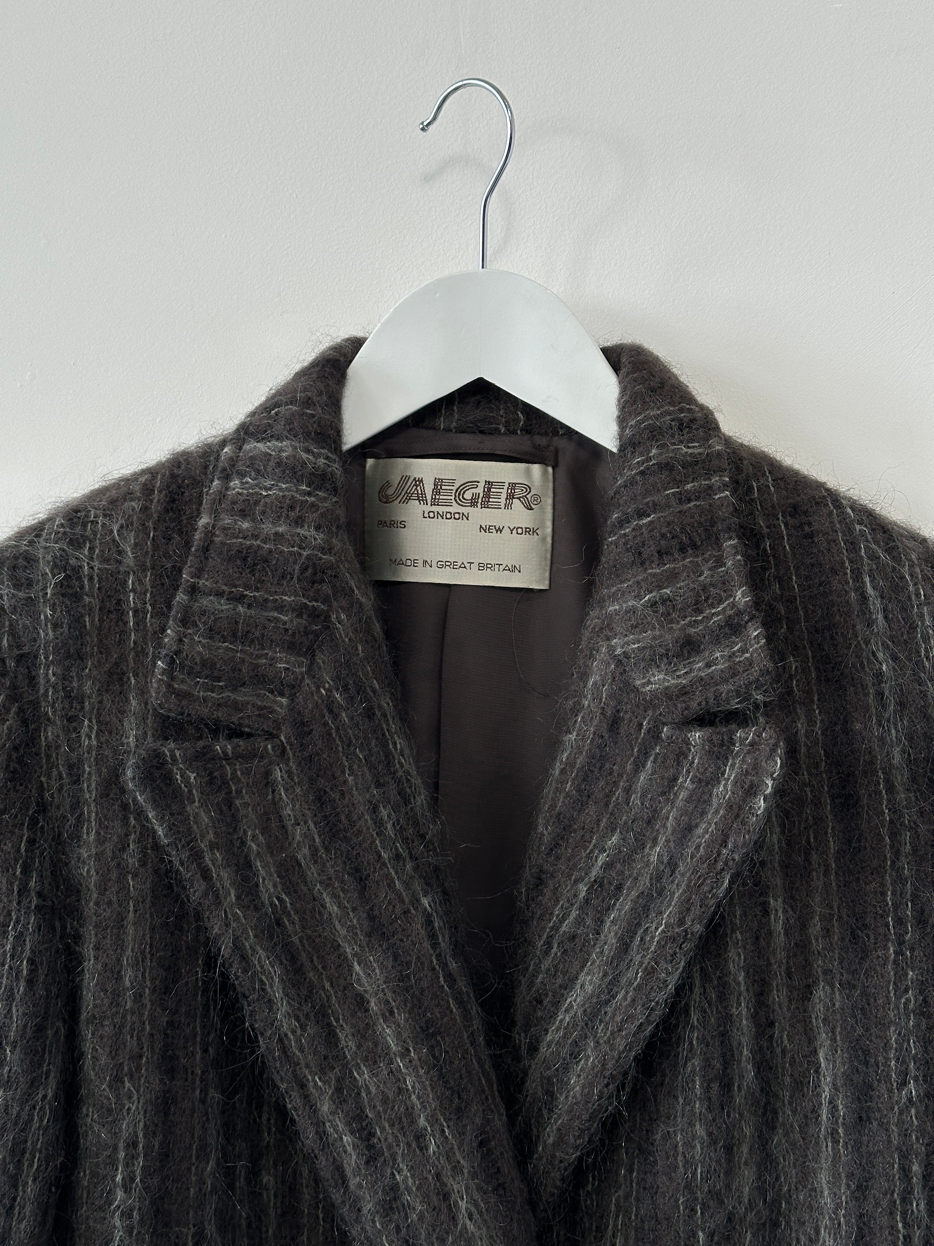 Jaeger Mohair fuzzy stripe double-breasted coat in size M, shown hanging with a soft, textured fabric and stylish design.