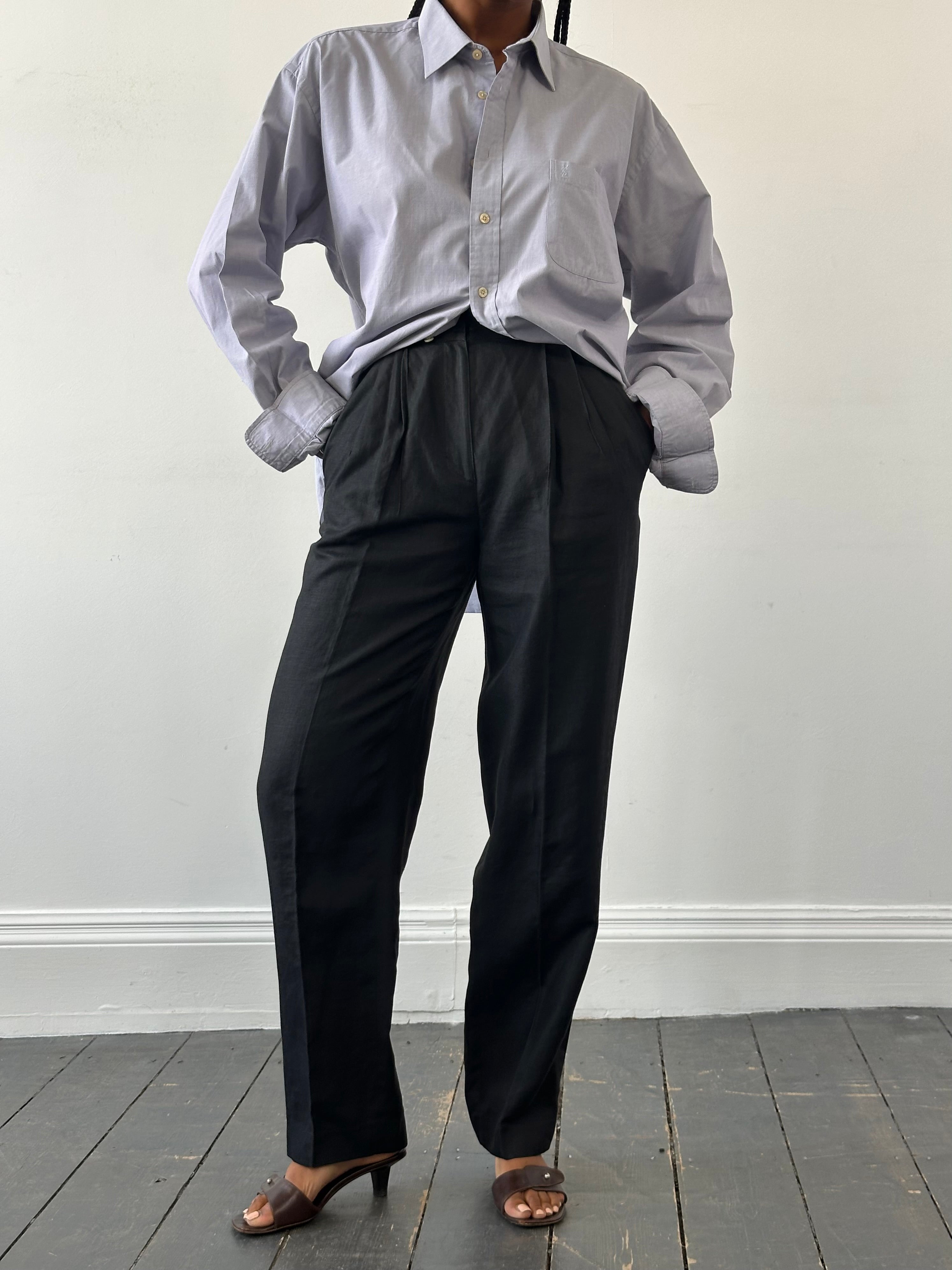 Versace 1980s linen high-waisted trousers in W24, showcasing classic tailored design and neutral fabric.