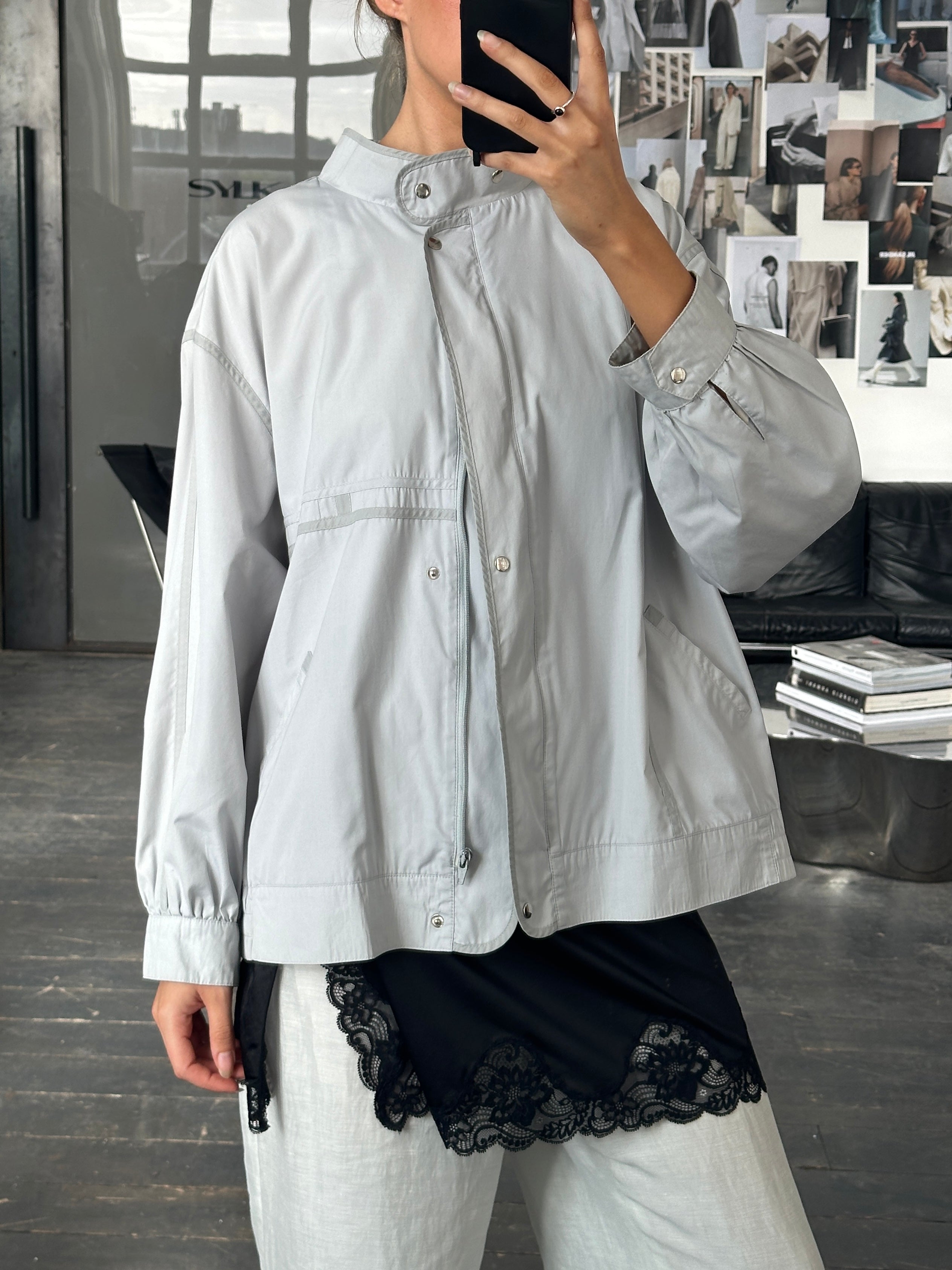 Vintage 2000s high neck bomber jacket in XL, showcasing classic design with a fitted high collar and retro style.