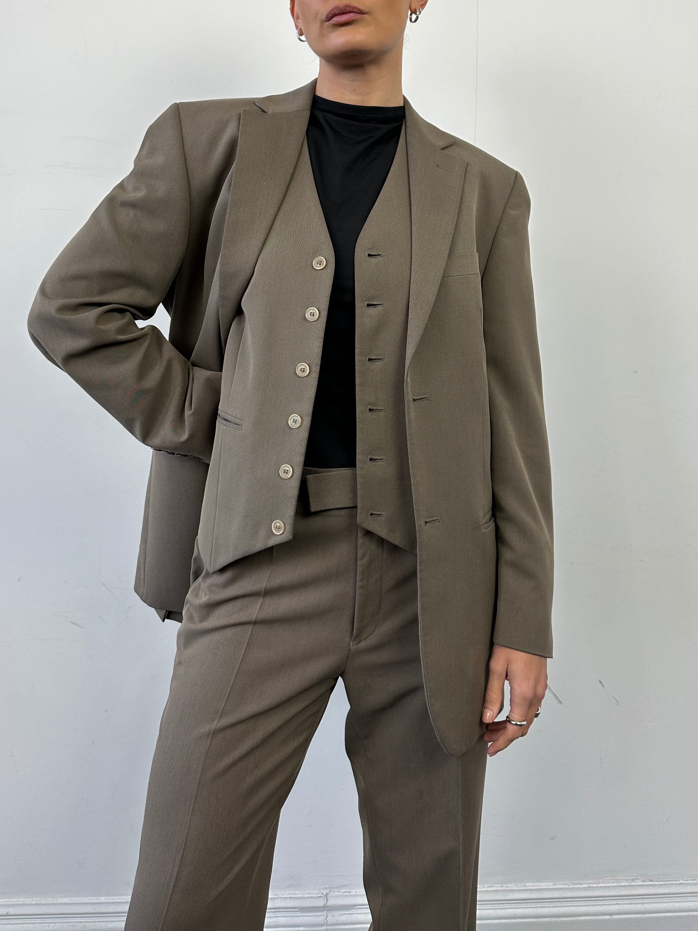 Vintage single-breasted three-piece suit in size 36R/W30, tailored fit with classic lapels, displayed on a neutral background.