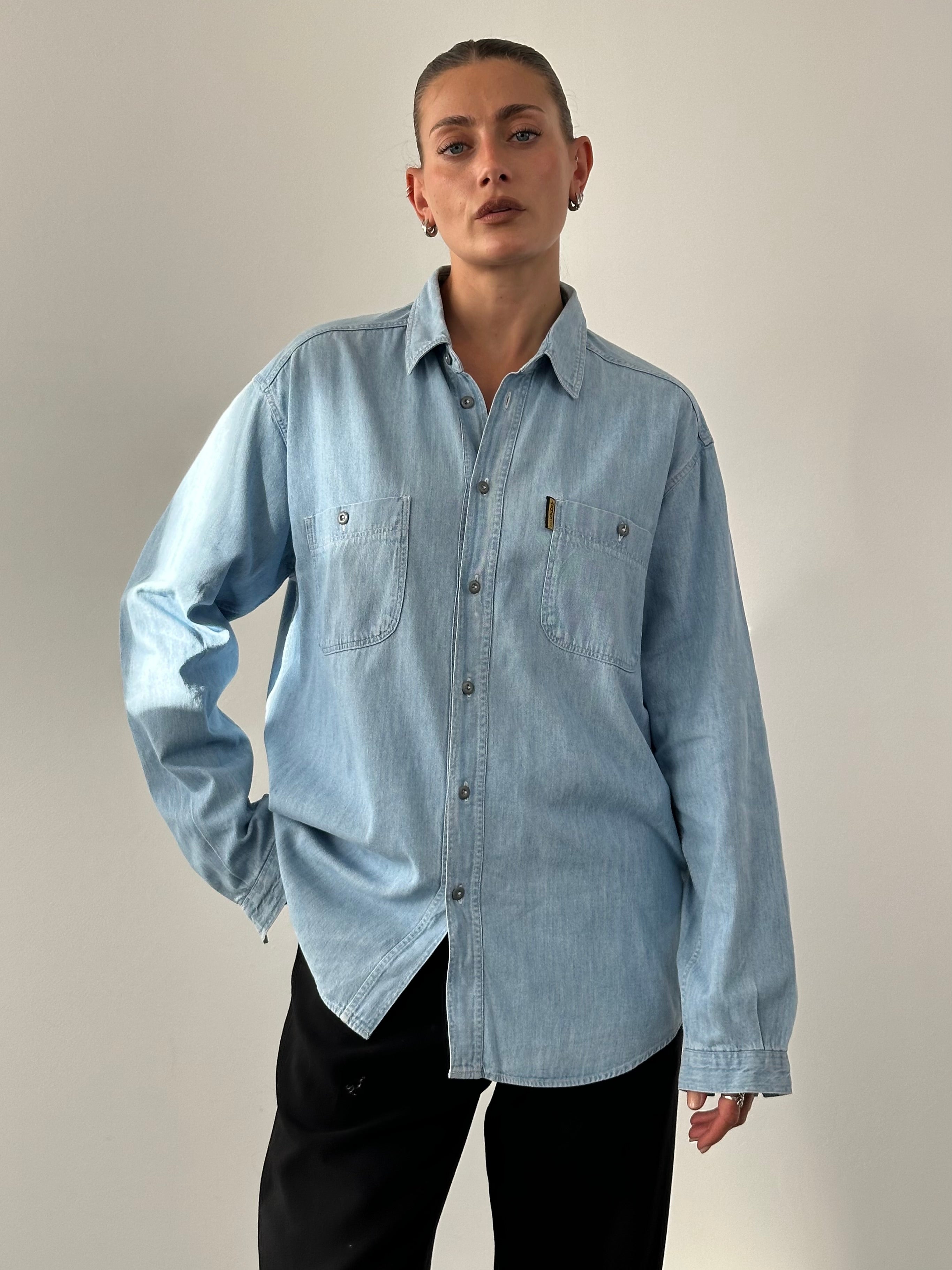 Armani Jeans pure cotton denim logo shirt in size XL, featuring a classic fit and embroidered Armani logo on the chest.