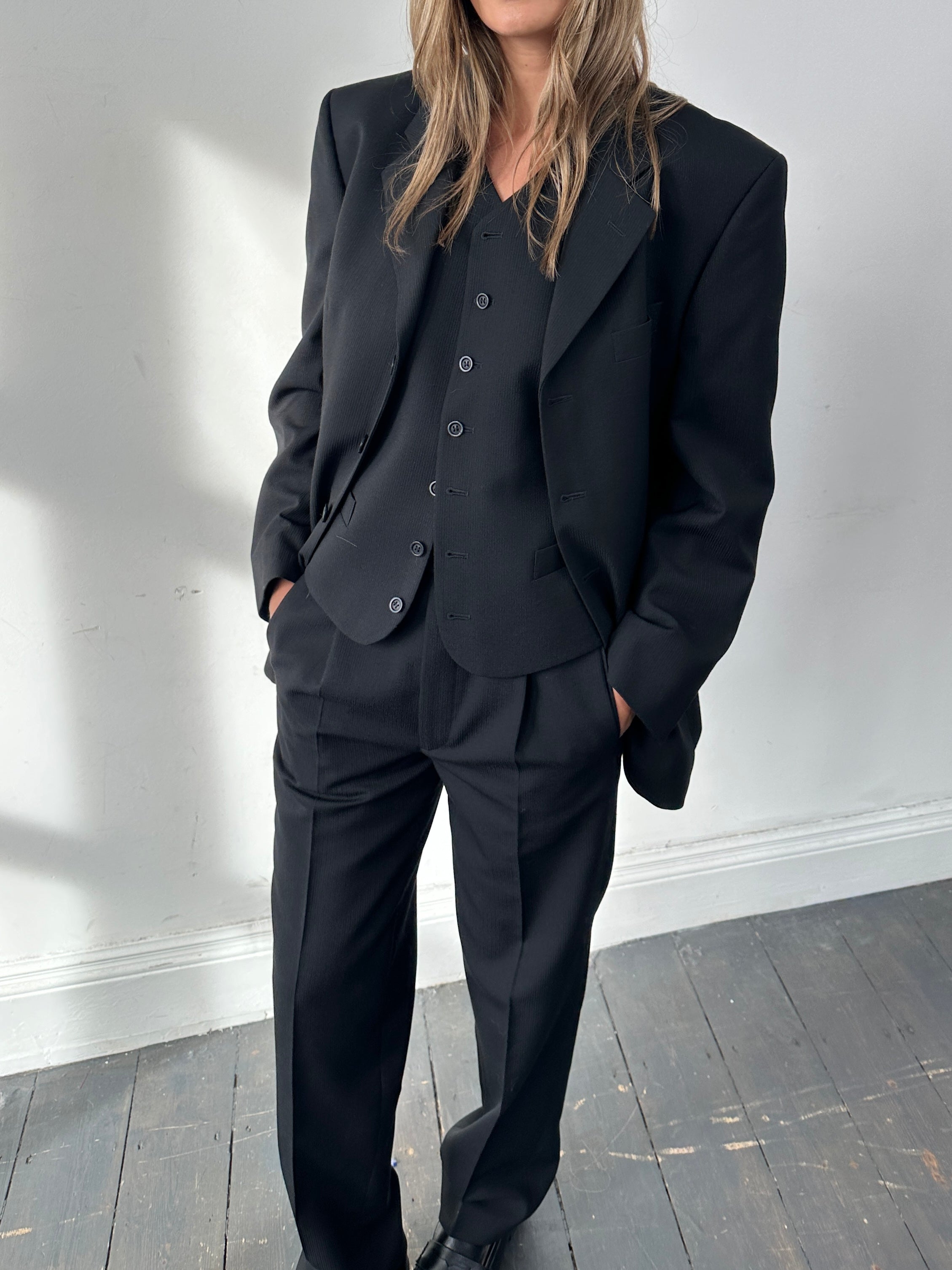 Vintage wool ribbed three-piece suit in size 38R/W30, featuring tailored jacket, vest, and trousers, displayed on a neutral background.