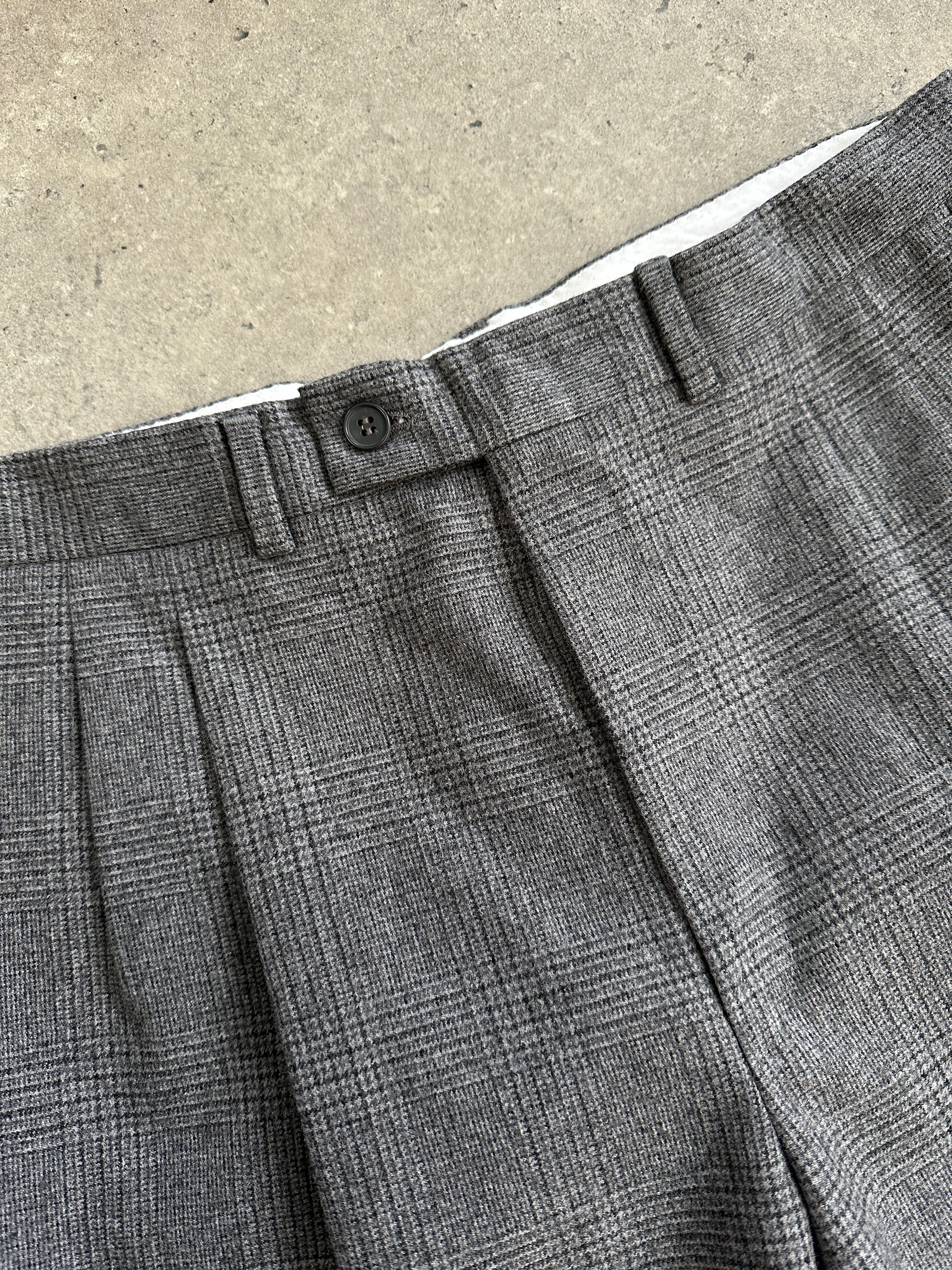 Vintage Italian vintage brushed wool check tailored trousers in size W30, featuring classic pattern and tailored fit.