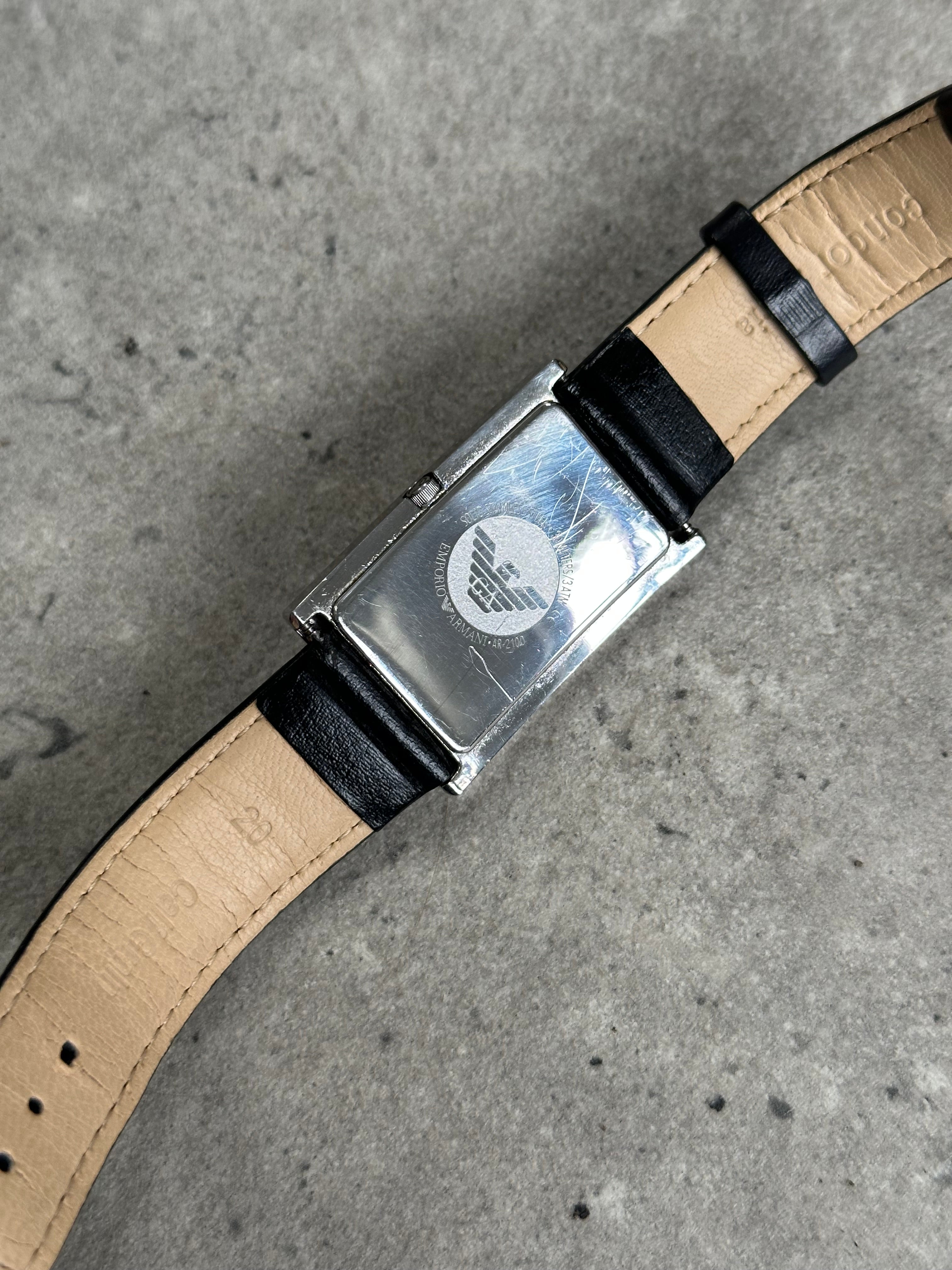 Emporio Armani 2000s rectangular stainless steel watch with leather strap, stylish and elegant accessory for men.