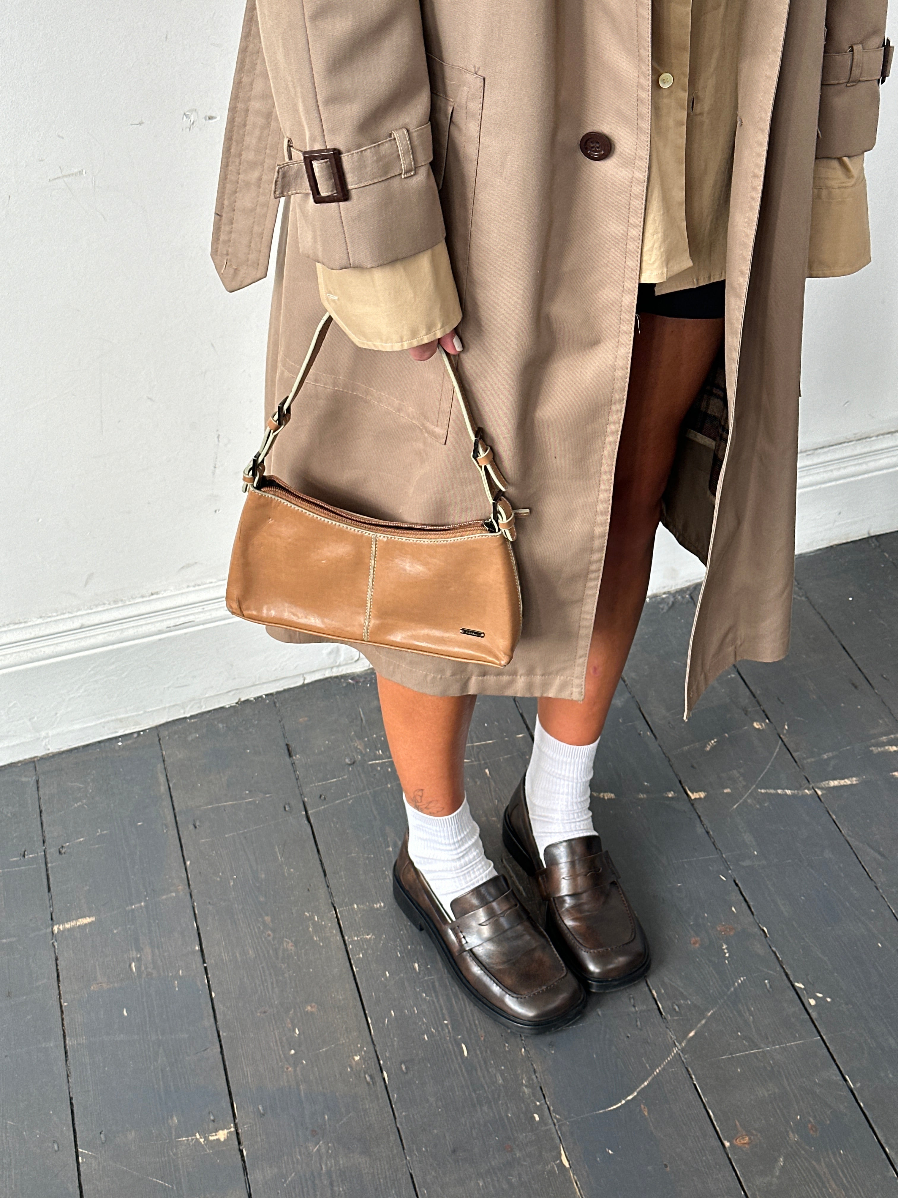 Vintage cotton single-breasted belted trench coat in XL, with classic design and neutral color, displayed on a hanger.