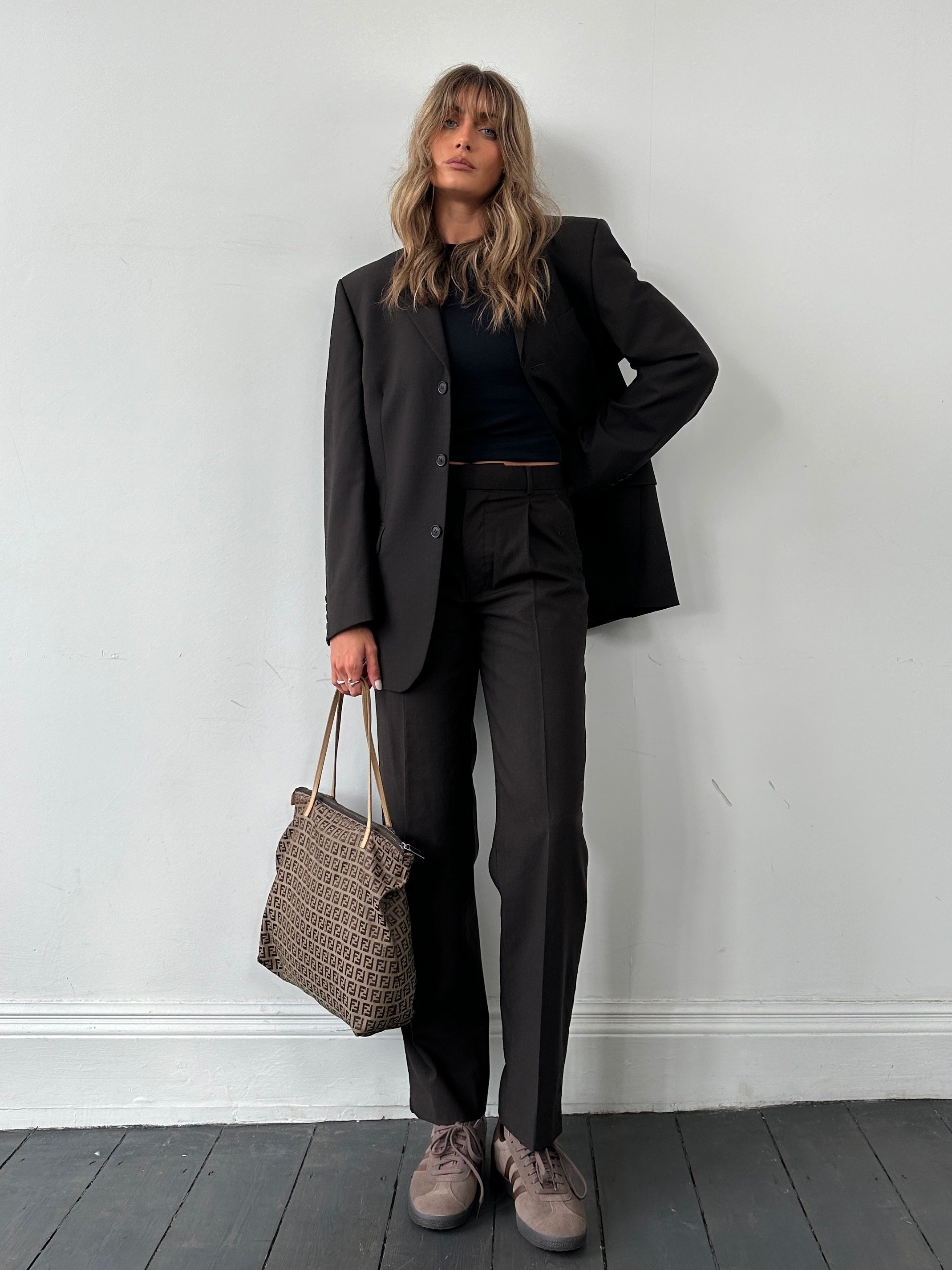 Vintage wool single-breasted suit jumpsuit in size 38R/W28, featuring classic tailored design and vintage style.