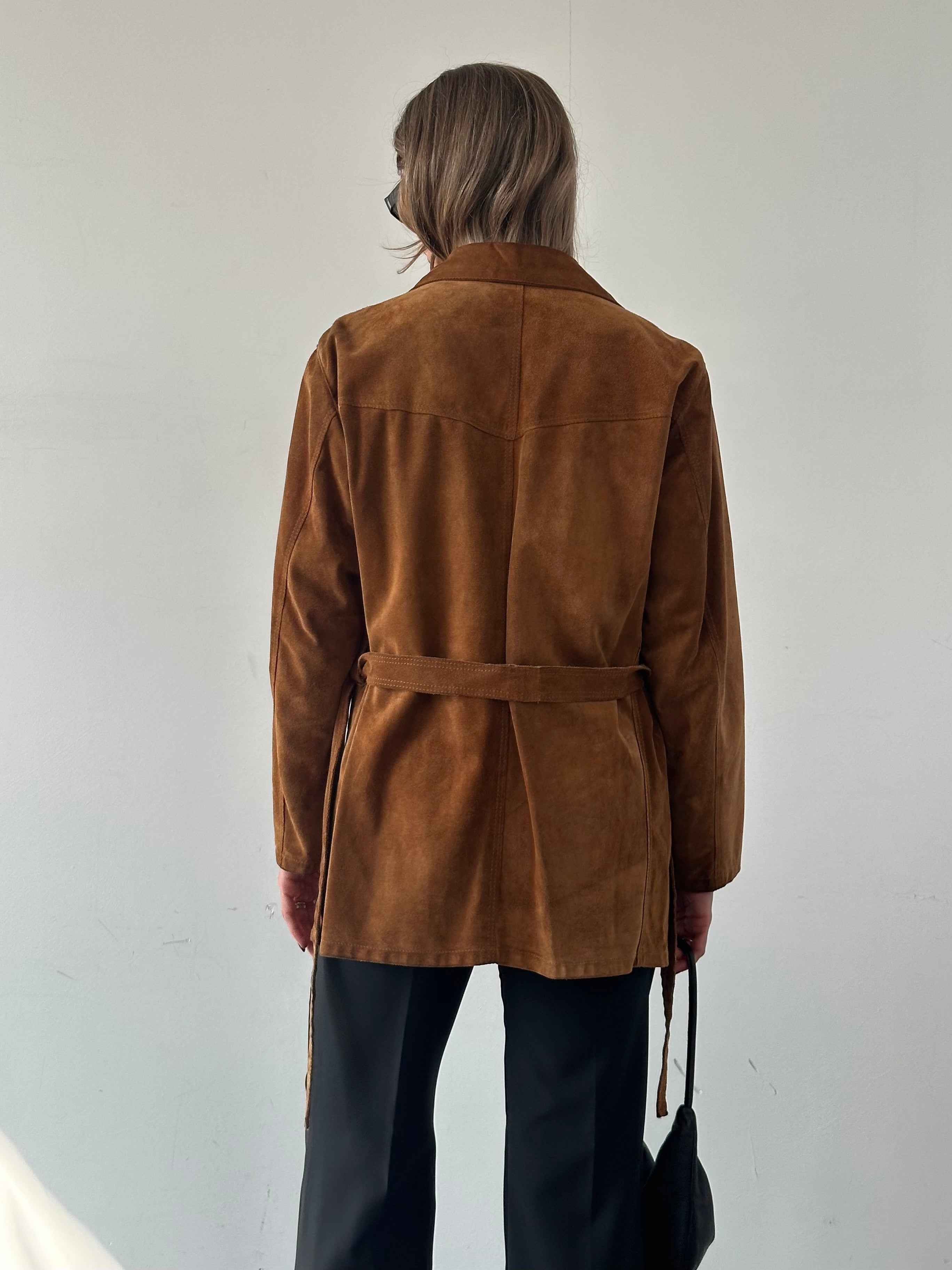 Vintage Italian suede belted jacket in M/L size, featuring classic design and stylish details visible in the image.