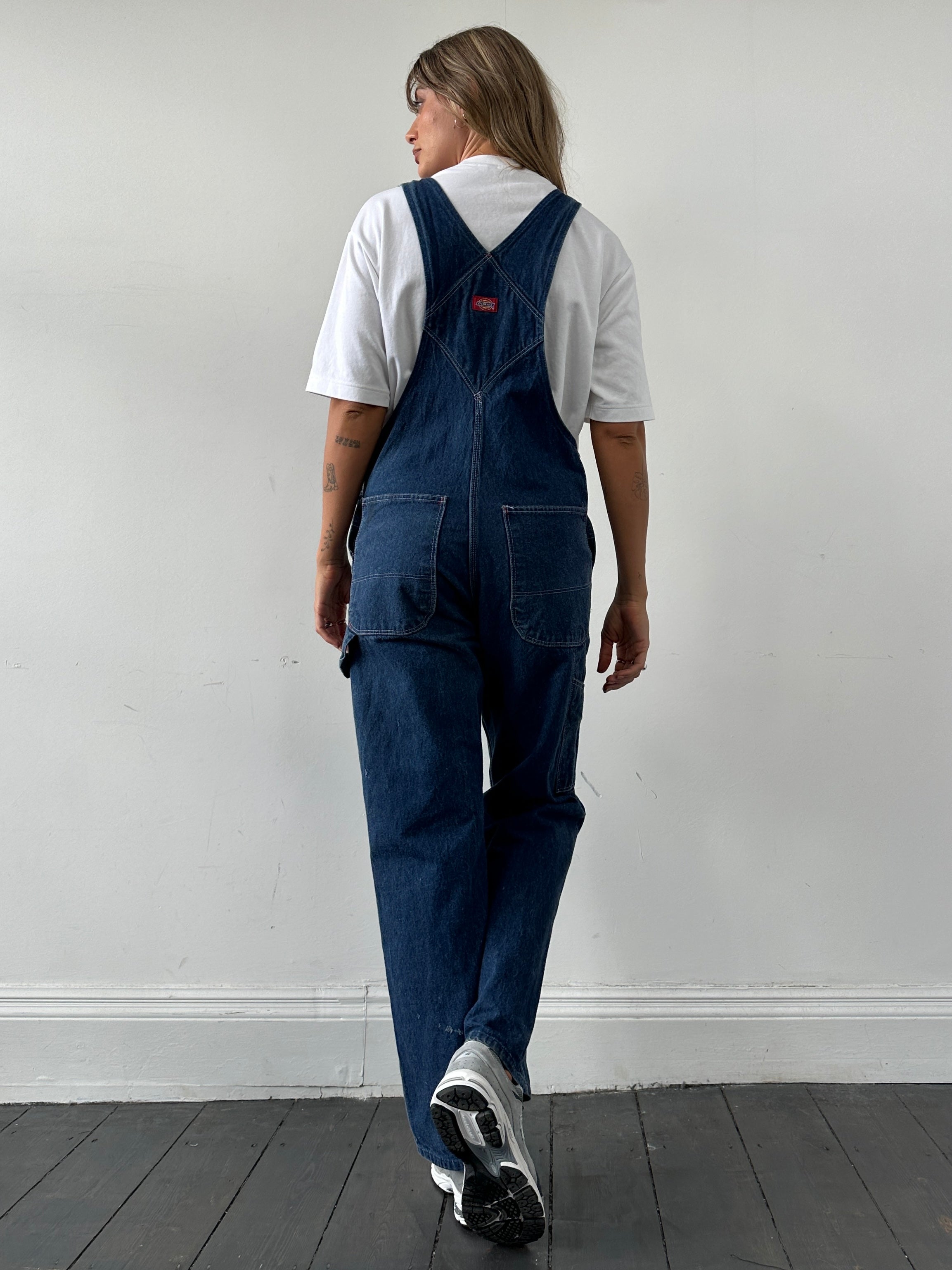 Dickies pure cotton denim dungarees in XS/S size, showing classic blue denim fabric with adjustable shoulder straps and front pockets.