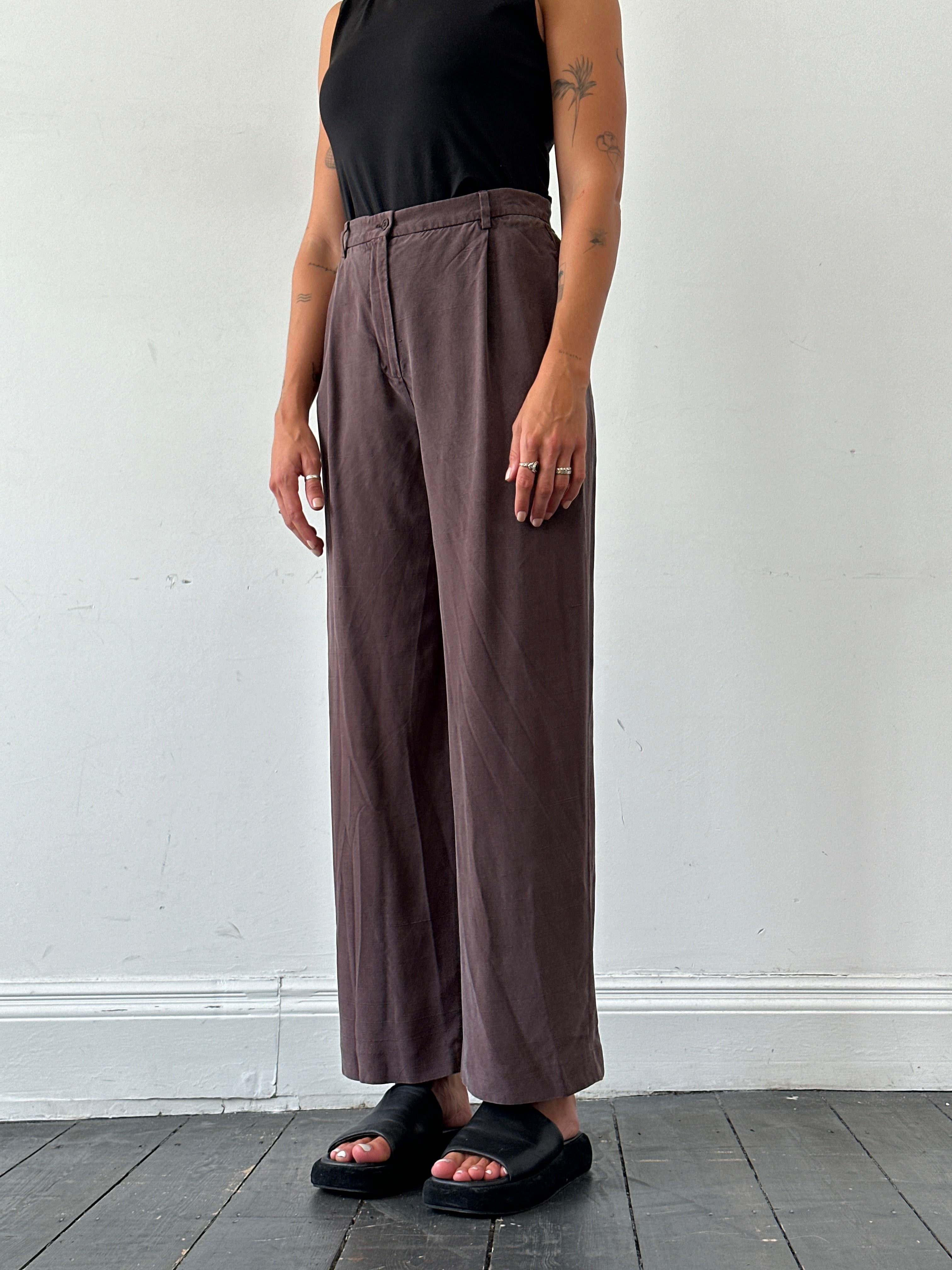 Max Mara pure silk wide-leg high-waisted trousers in cream, showing front view with smooth fabric and tailored fit.
