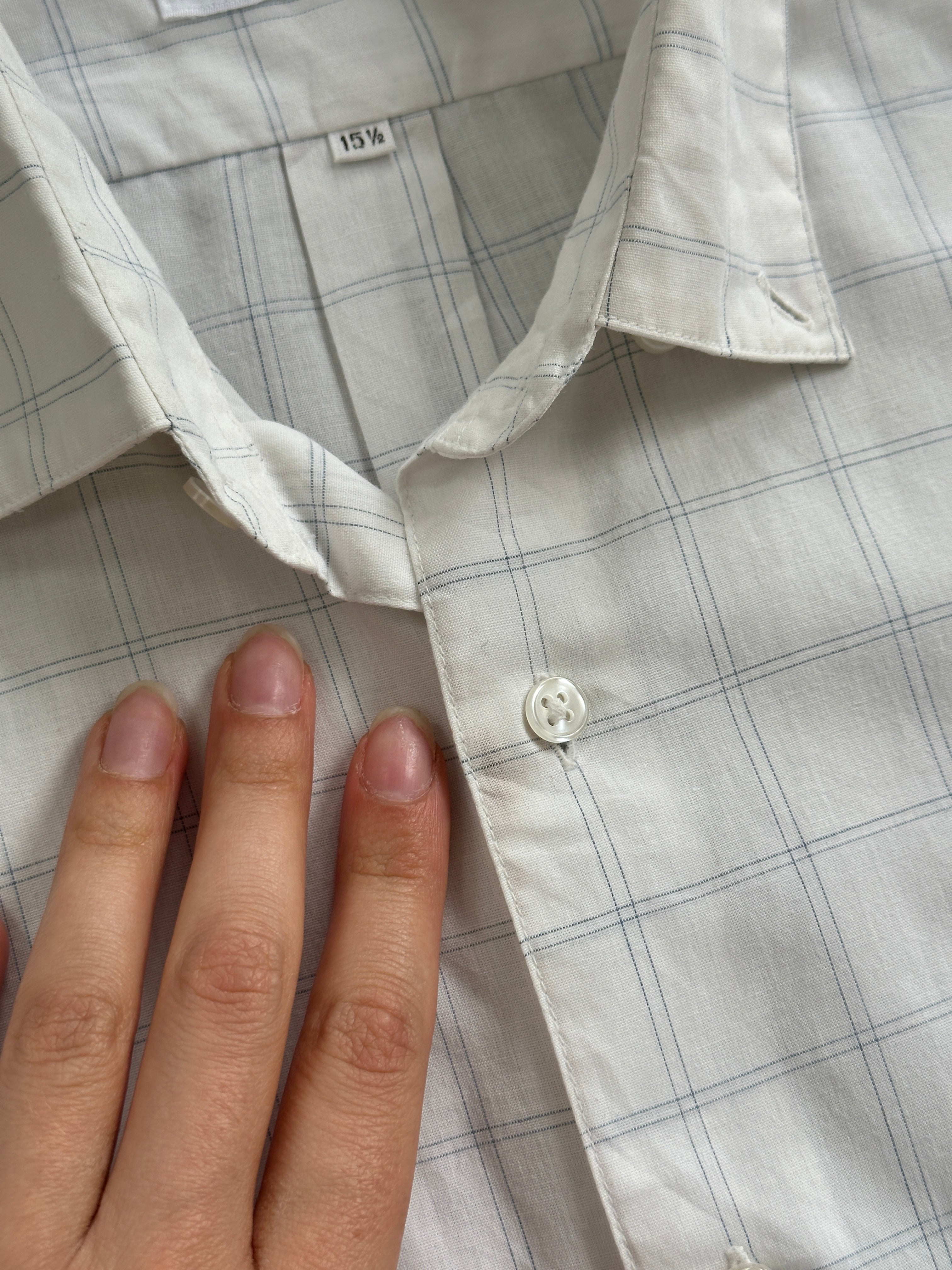 Yves Saint Laurent cotton check logo shirt in size M, featuring classic check pattern and YSL branding on the front.